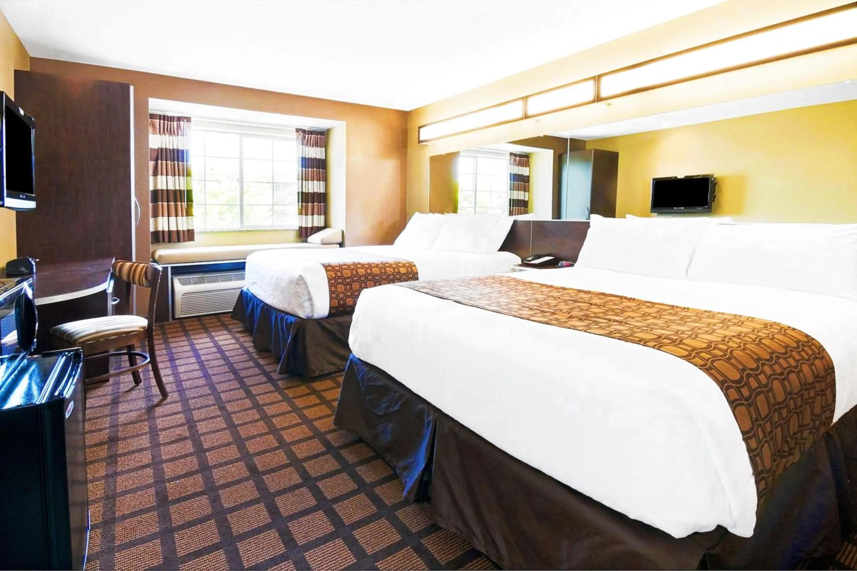 Queen Room with Two Queen Beds - Non-Smoking in Microtel Inn & Suites by Wyndham Macon