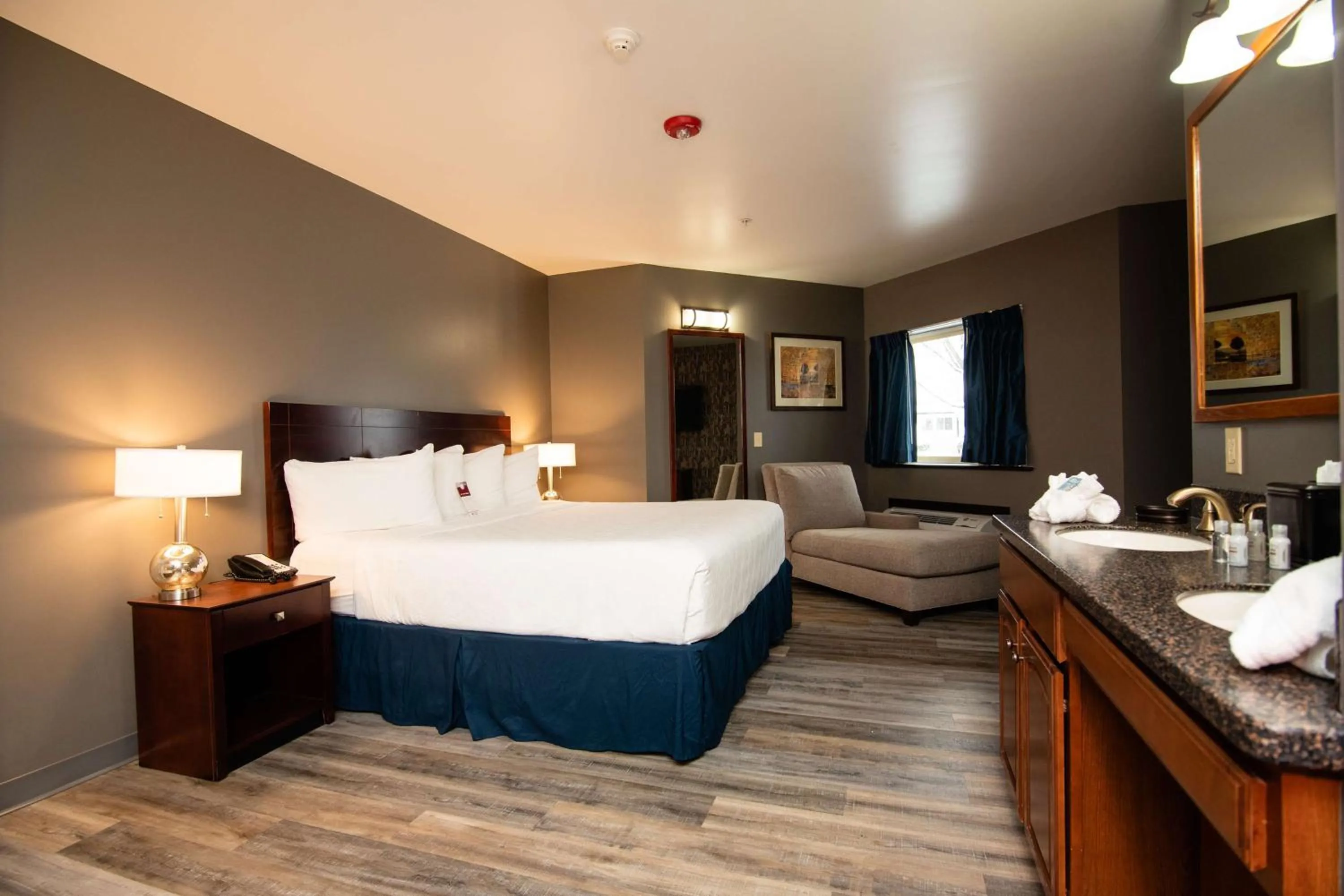 King Suite with Sofa Bed and Walk-In Shower - Jetted Tub/Disability Access in Best Western Plus Plattsburgh