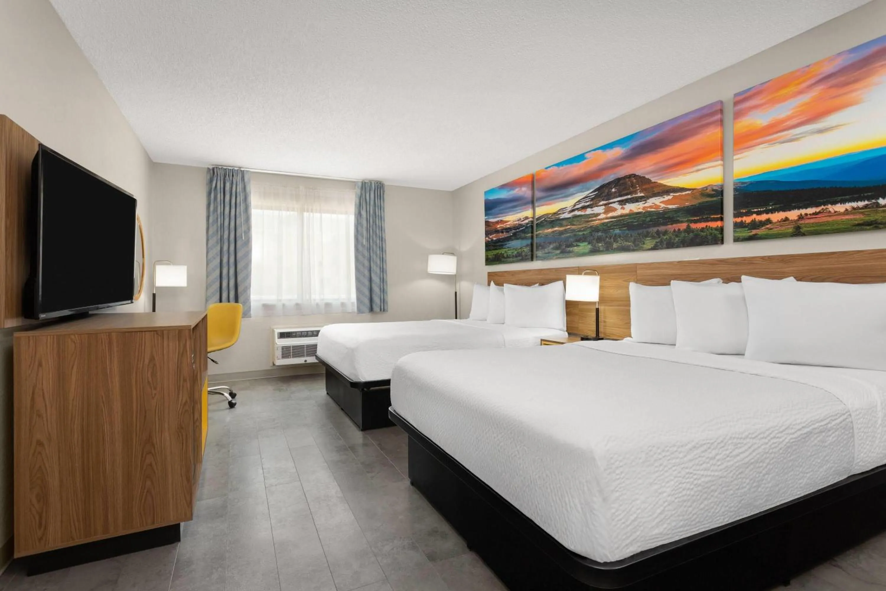 Queen Room with Two Queen Beds - Non-Smoking in Days Inn by Wyndham Rawlins