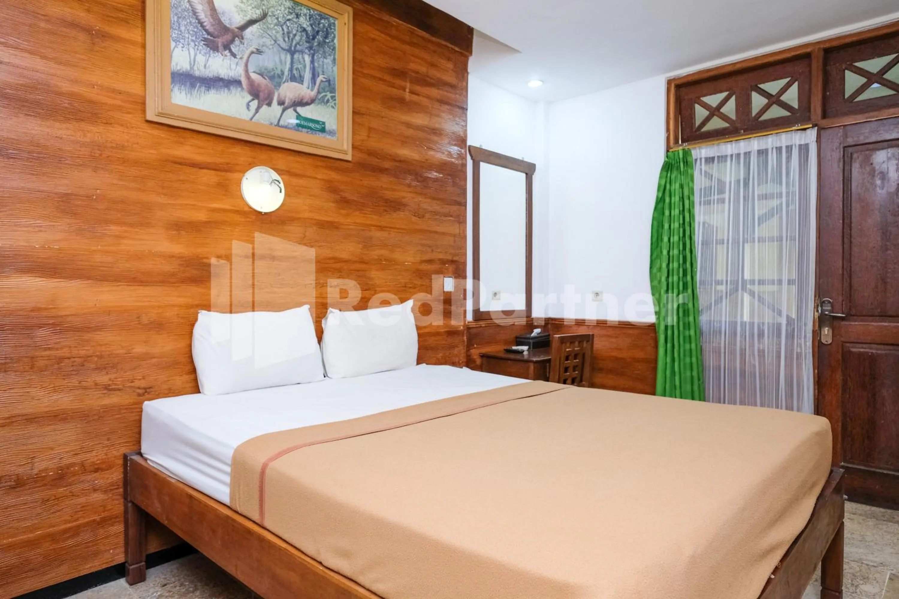 Standard Double Room in The Soemarsono Hotel near Ambarrukmo Plaza Mall RedPartner