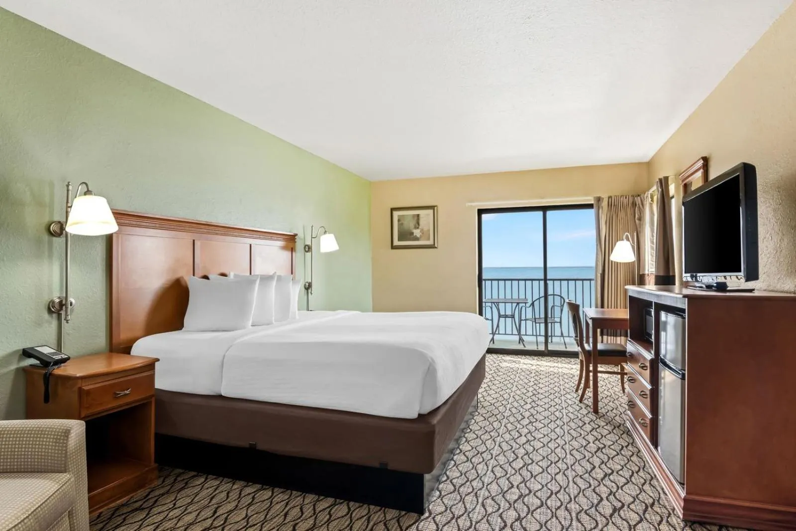 King Bed Handicapped Room with Balcony in Beachfront Hotel Houghton Lake