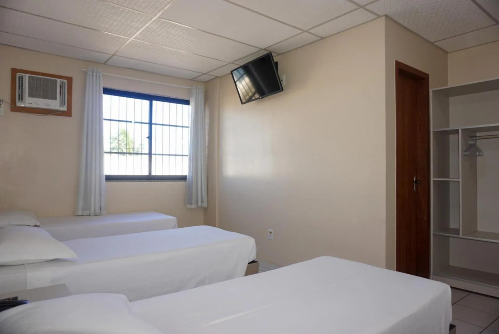 Standard Triple Room in Lord Hotel Camburi