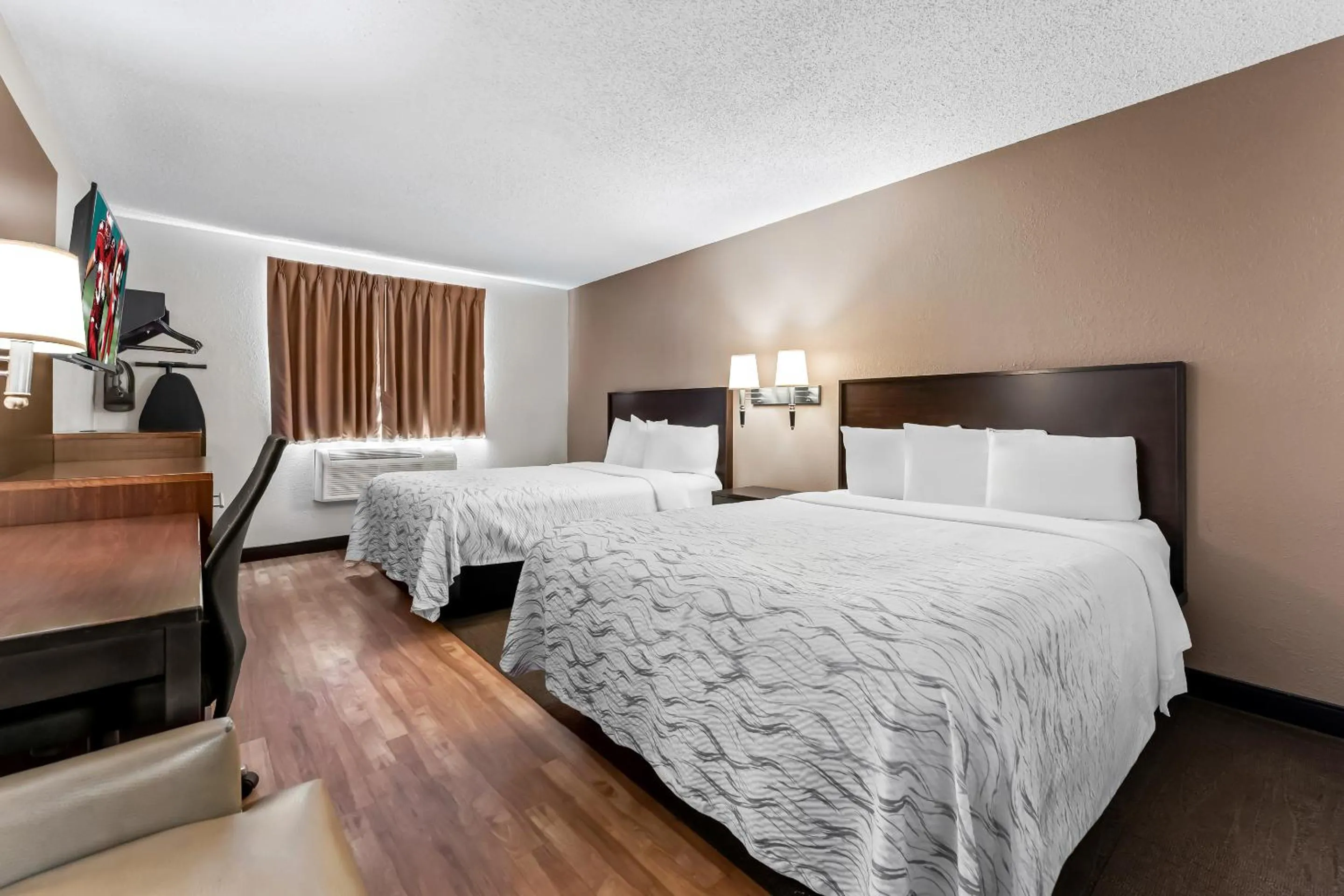 Deluxe Room with Two Queen Beds Larger Room Smoke Free in Red Roof Inn PLUS+ & Suites Malone