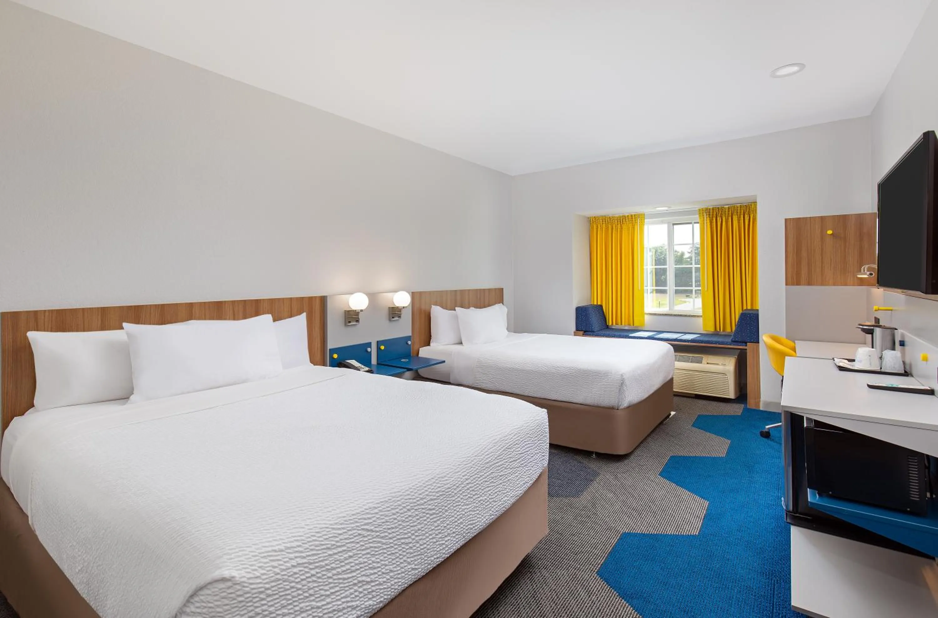 Deluxe Queen Room with Two Queen Beds - Disability Access - Non-Smoking in Microtel Inn & Suites Columbus North