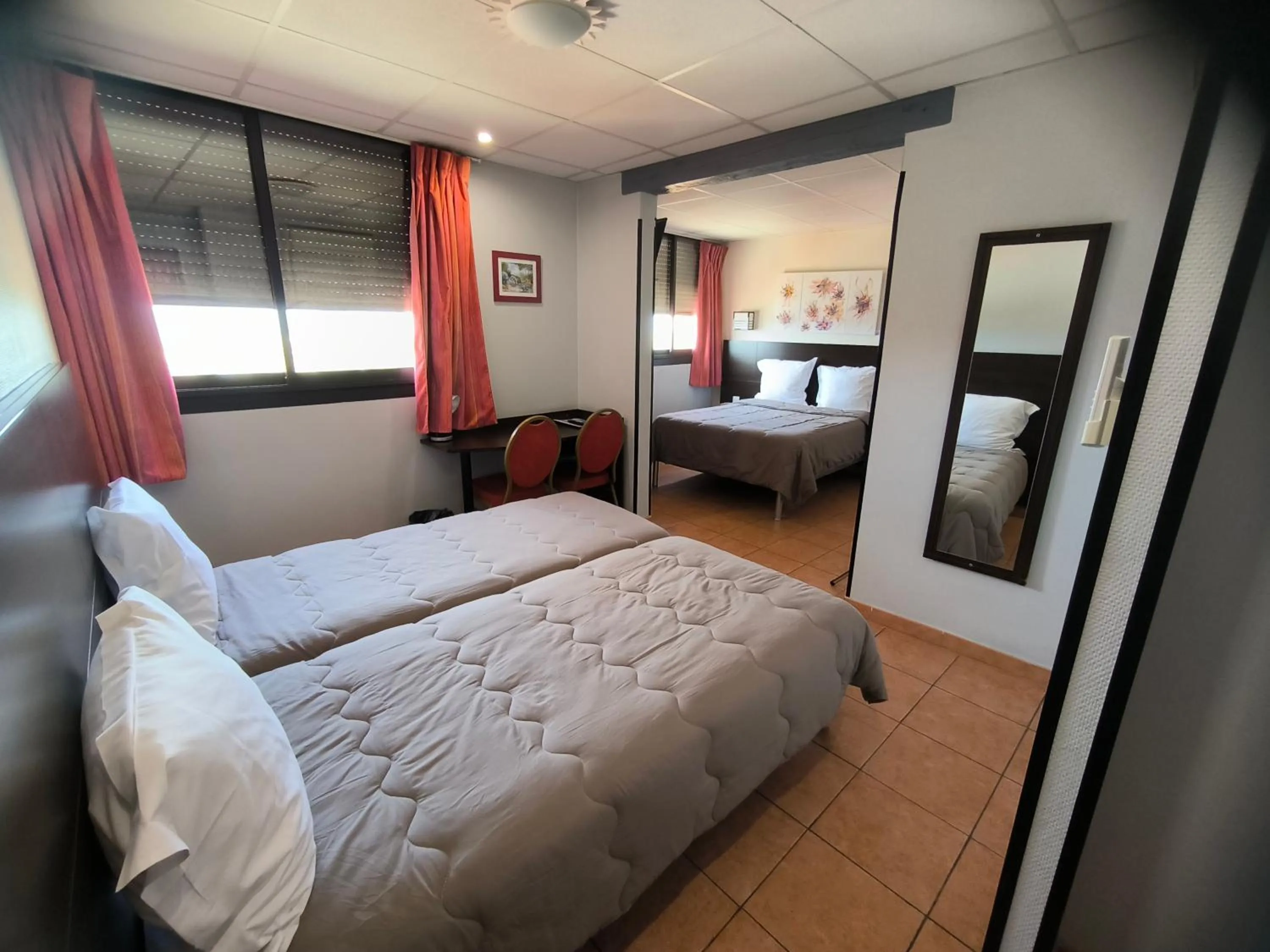 Quadruple Room - single occupancy in Hôtel L'Hacienda