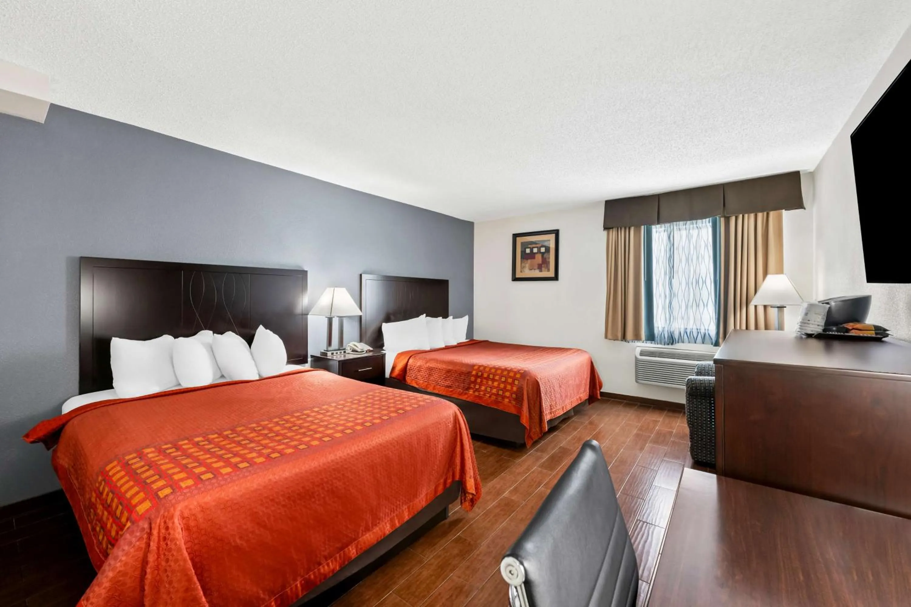 Queen Room with Two Queen Beds - Non-Smoking in SureStay Plus Hotel by Best Western Lubbock Medical Center