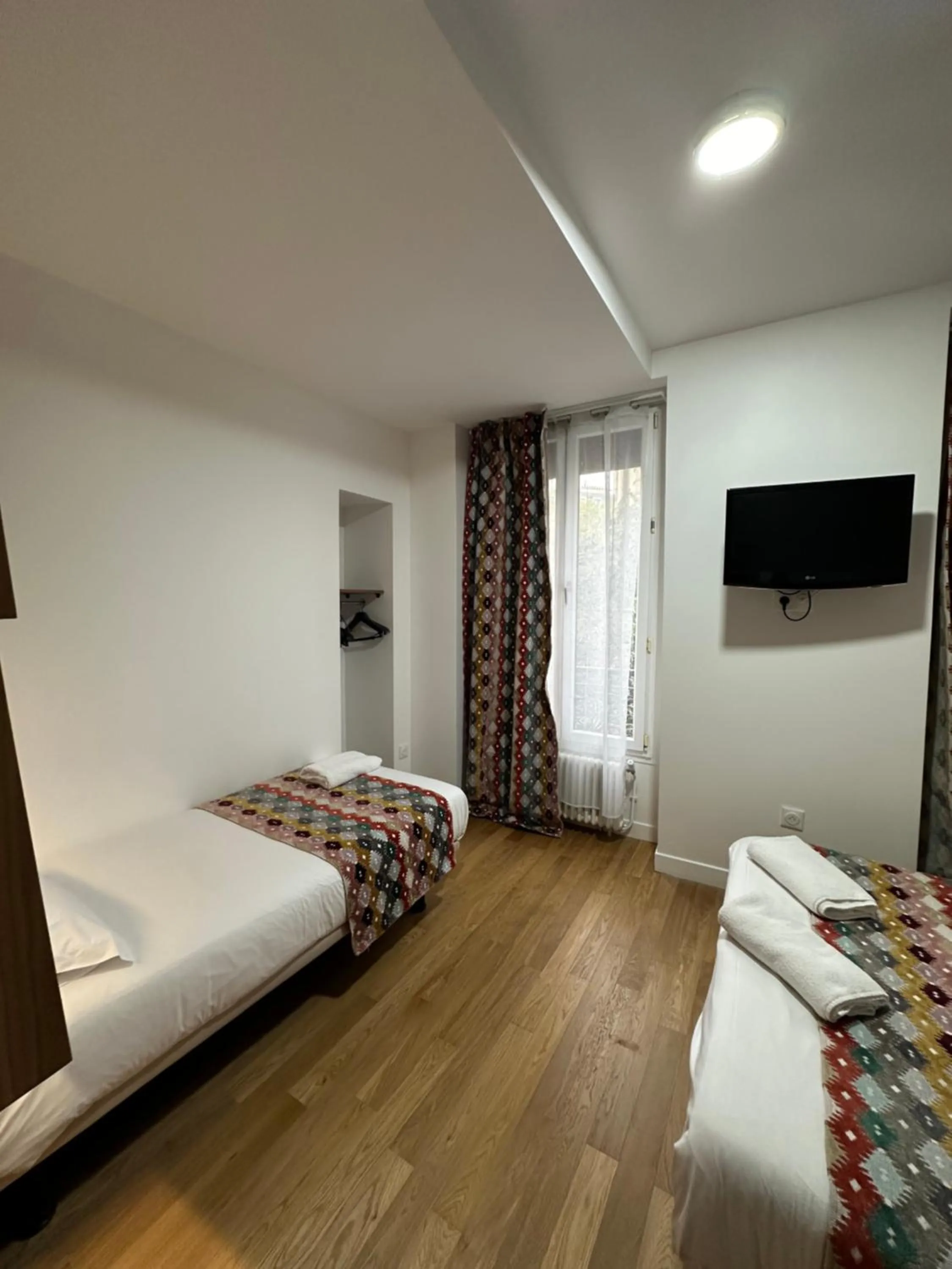 Deluxe Triple Room in Hotel Paris Bruxelles