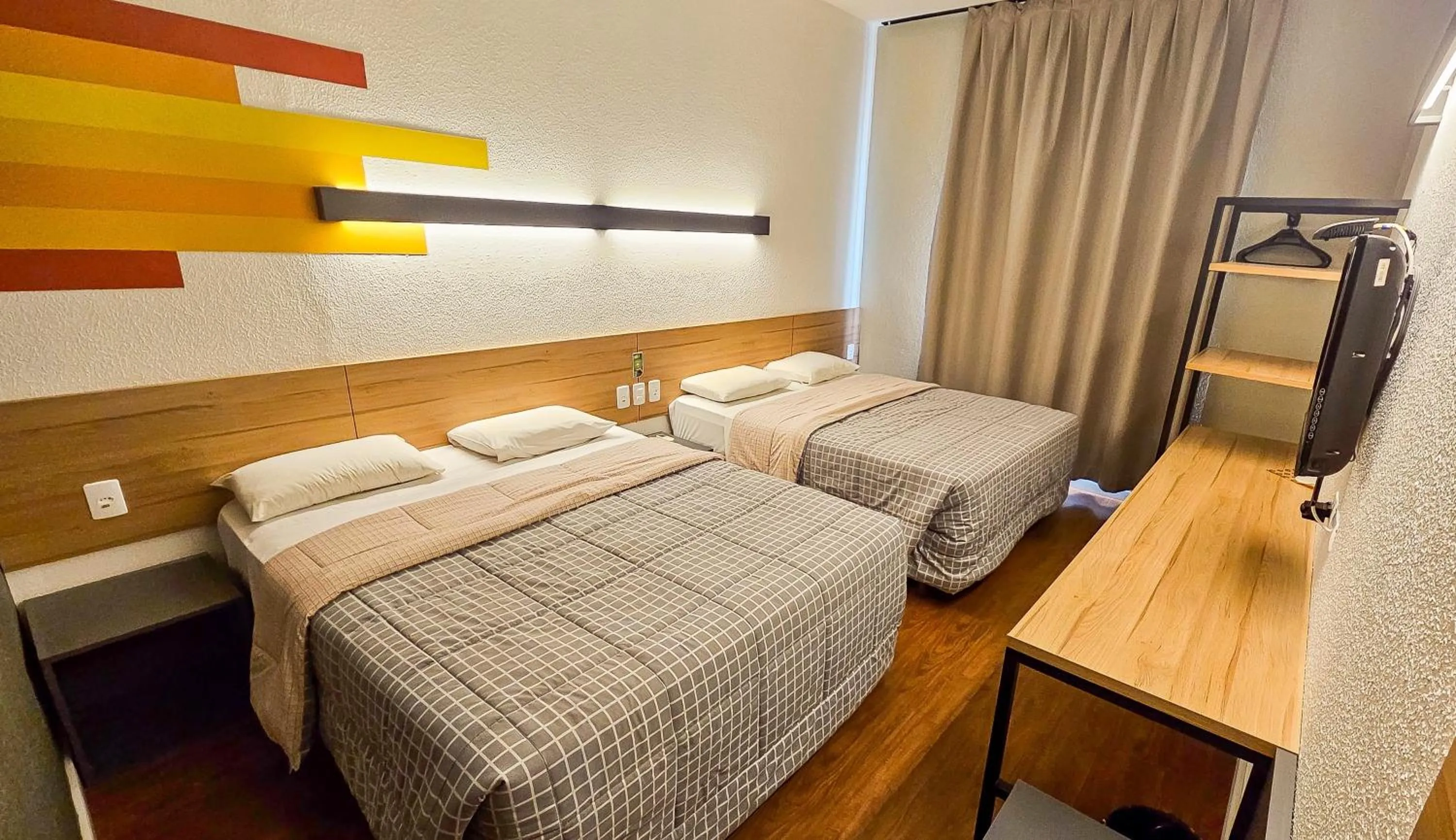 Standard Room with Two Double Beds - single occupancy in Hotel 10 Joinville