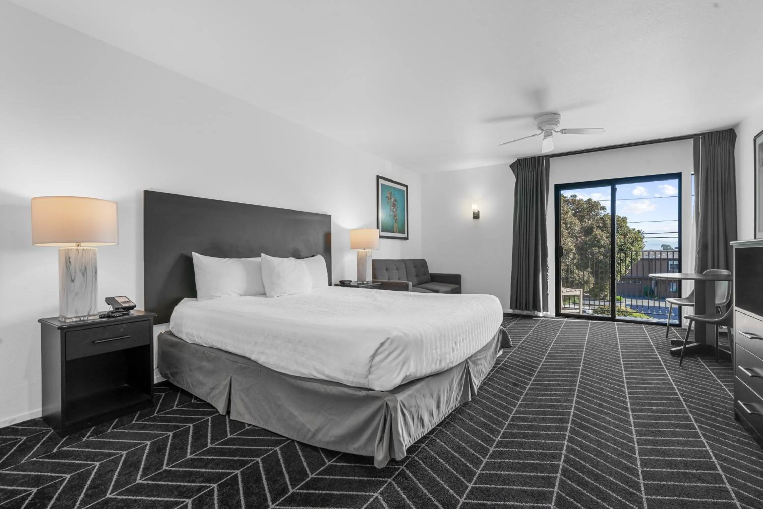 Deluxe Room 1 King Bed fireplace and balcony non-smoking in Masterpiece Hotel