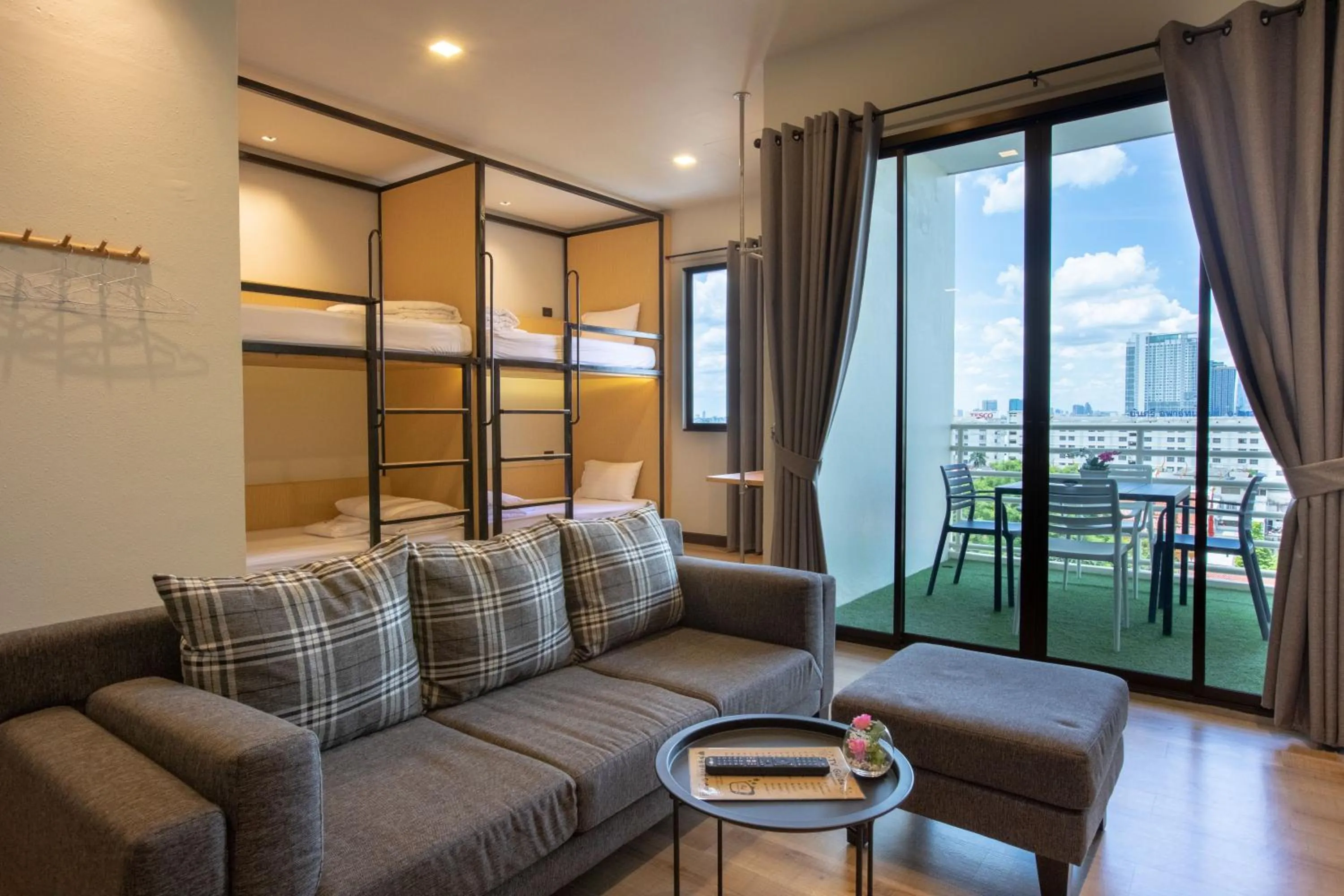 Bunk Bed with Private Balcony Room in The Royal River Hotel