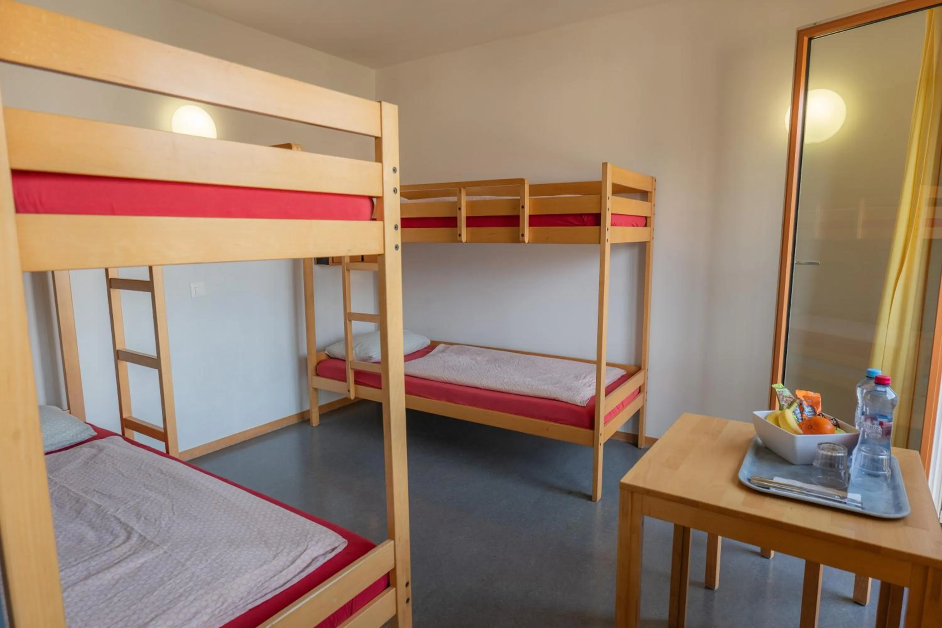 Quadruple Room with Shared Bathroom in Locarno Youth Hostel