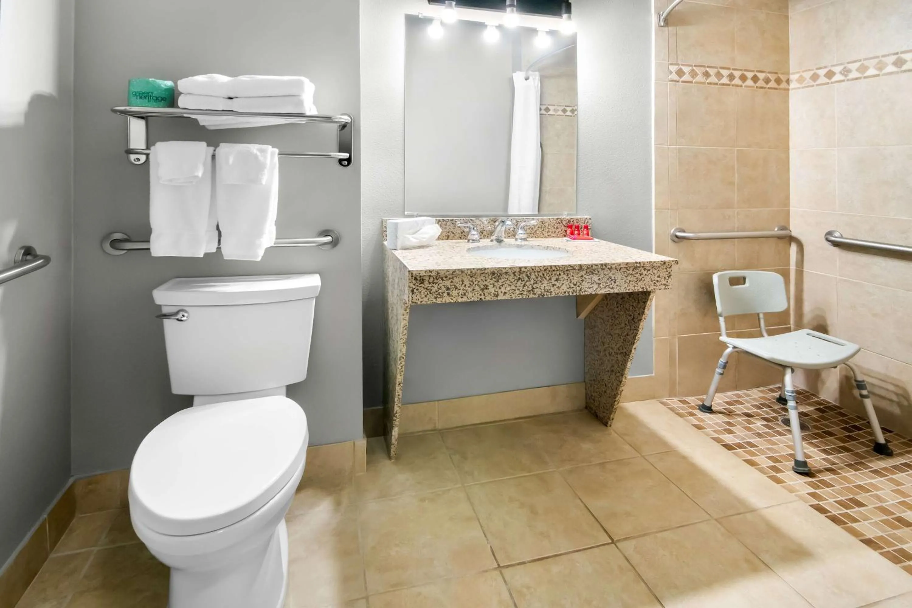 Two-Room King Suite with Walk-In Shower and Sofa Bed - Disability/Non-Smoking in Big Country Hotel & Suites, SureStay Collection by BW