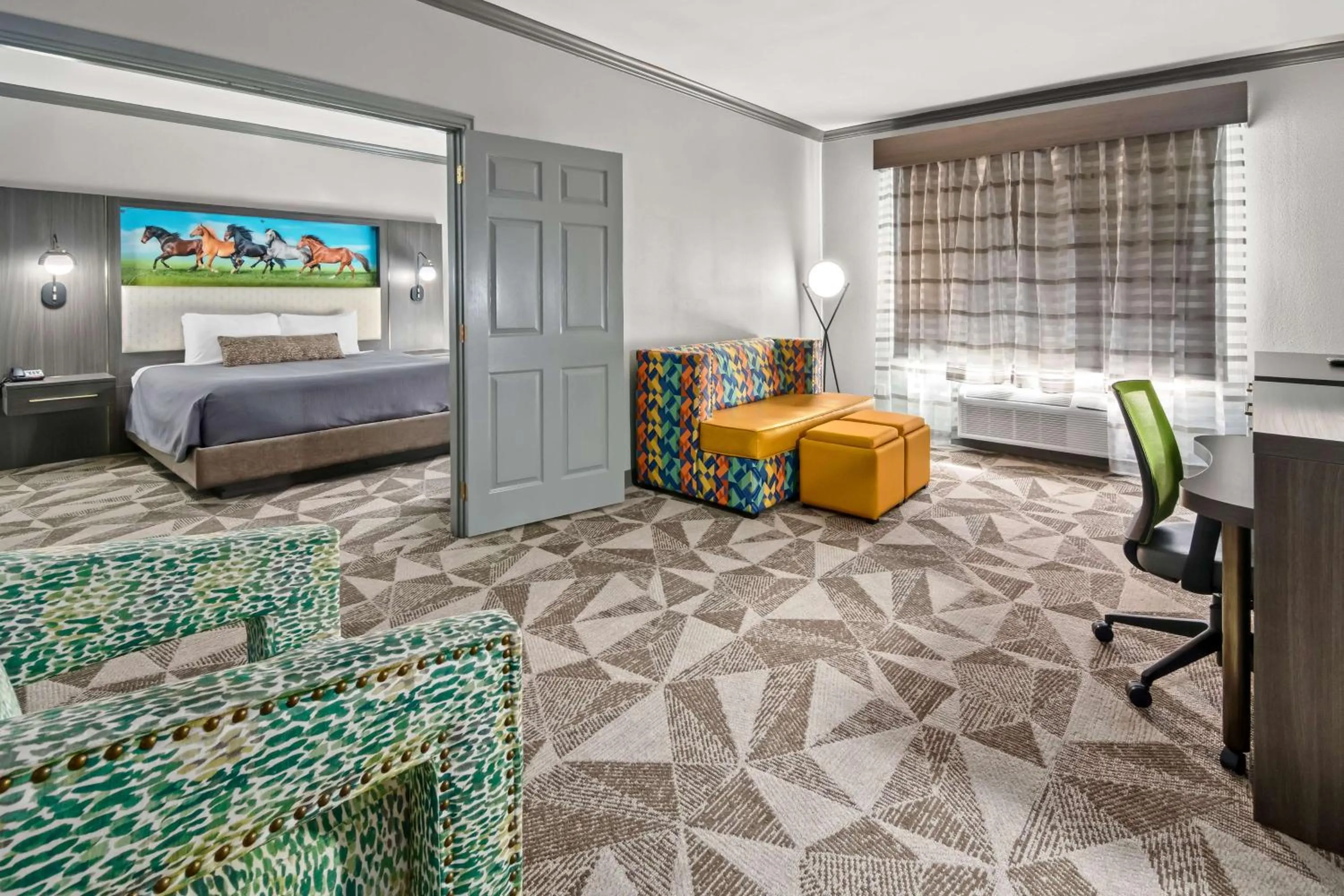 Two-Room King Suite with Sofa Bed and Spa Bath - Non-Smoking in Big Country Hotel & Suites, SureStay Collection by BW