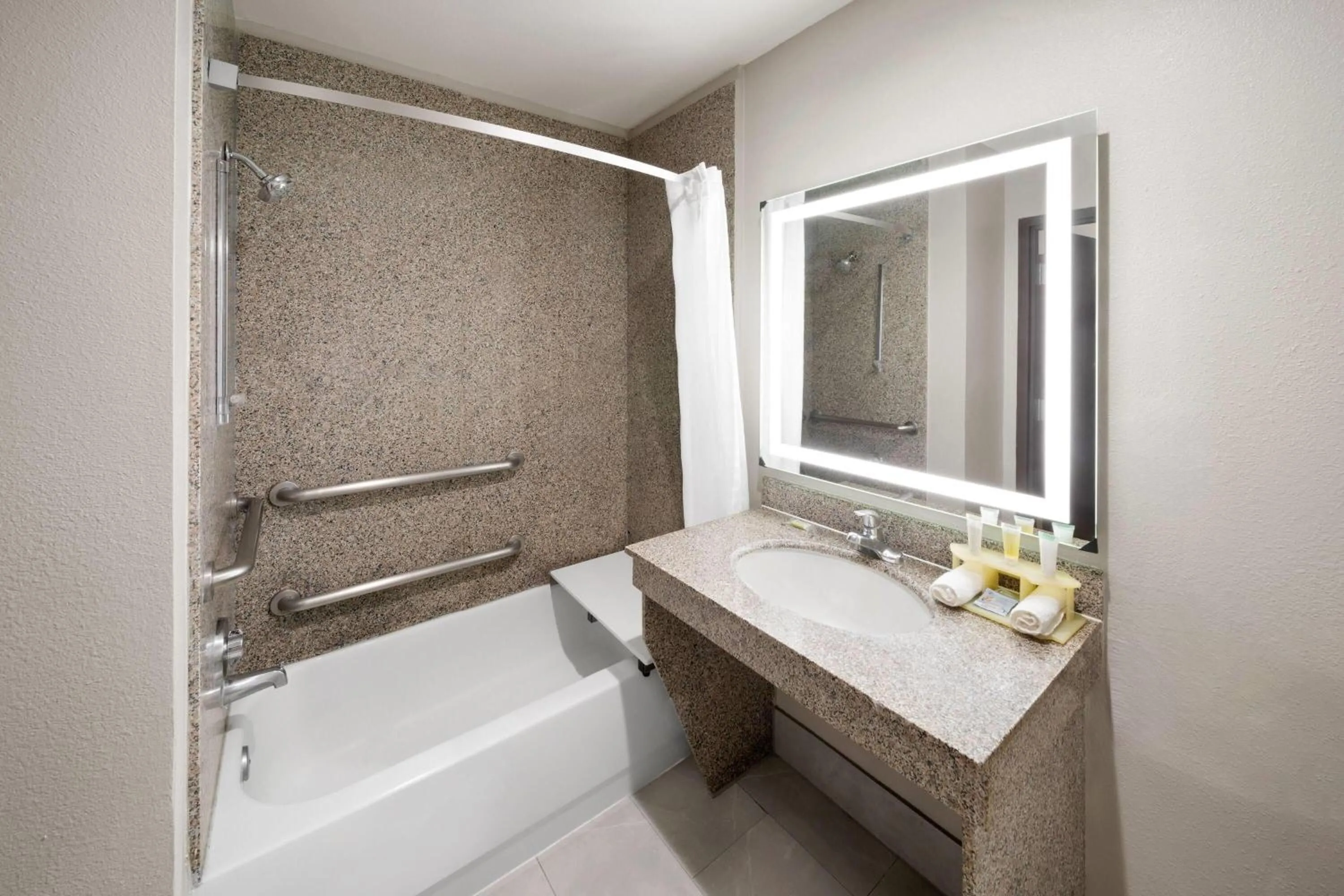 King Suite with Mobility Access and Bathtub with Grab Bars, Non-Smoking in Days Inn & Suites by Wyndham Sam Houston Tollway