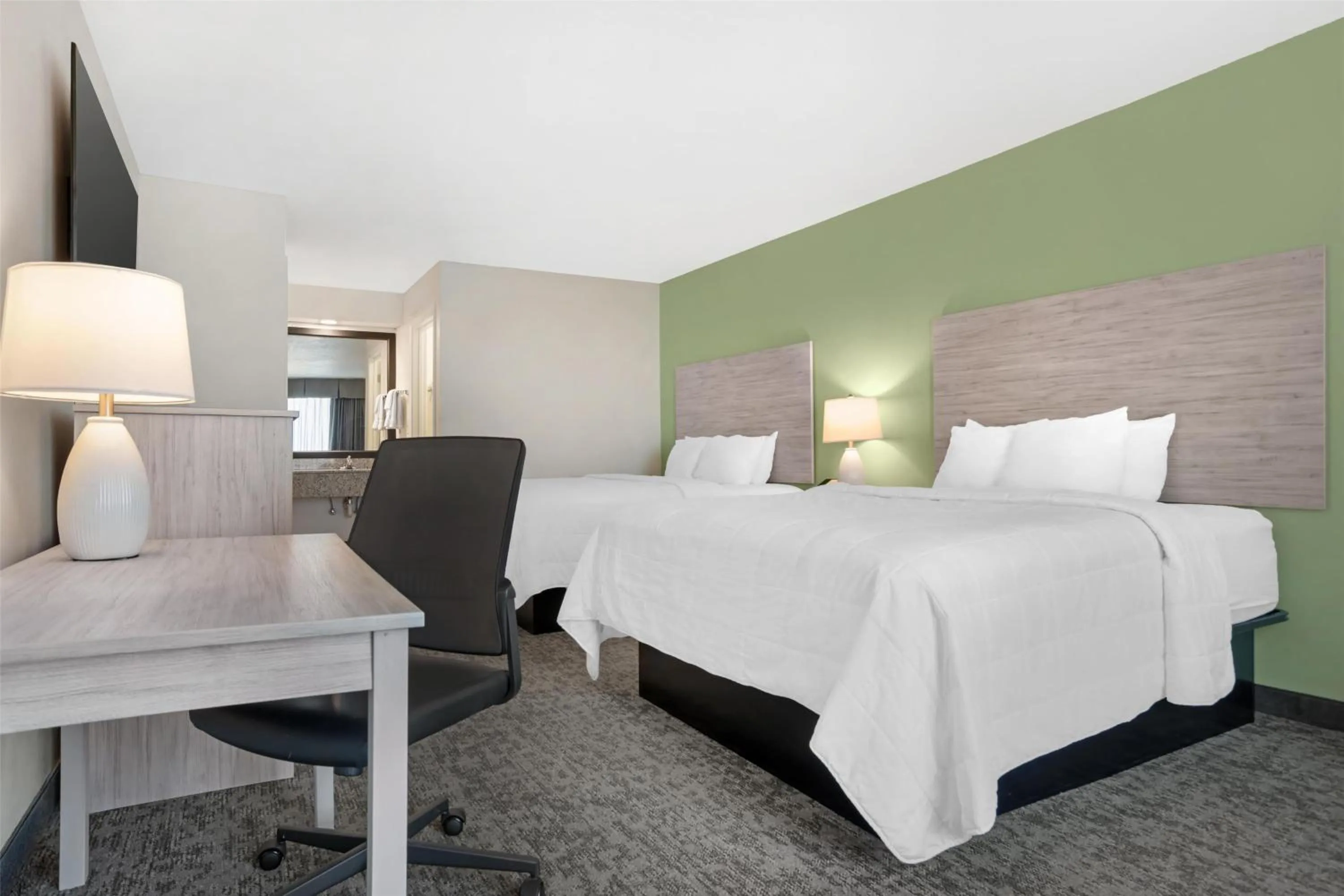 Queen Room with Two Queen Beds - single occupancy - Pool View in Best Western Navarre Waterfront