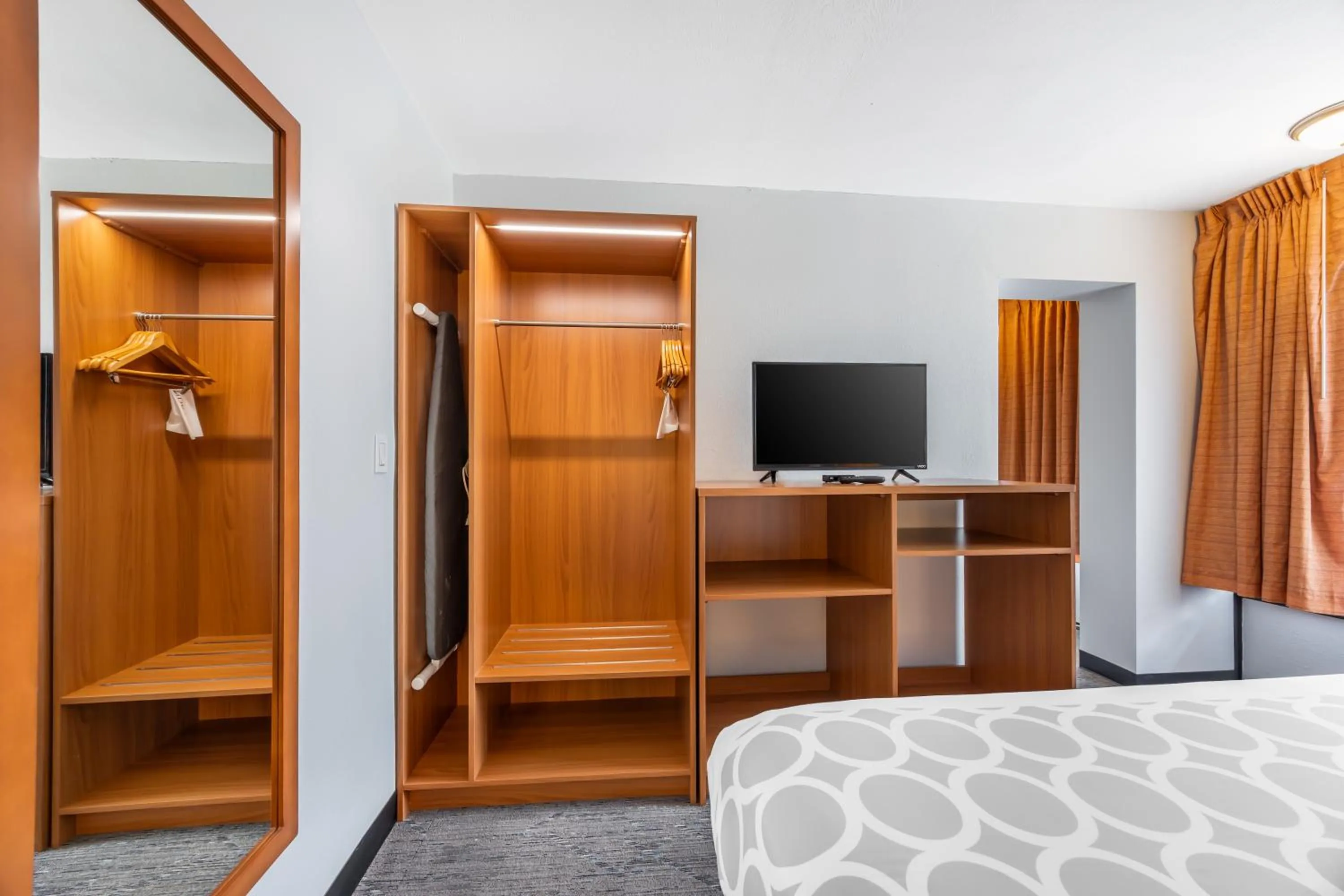 Family Room with One King and One Queen Bed - Non-Smoking in Suburban Studios Branson On The Strip