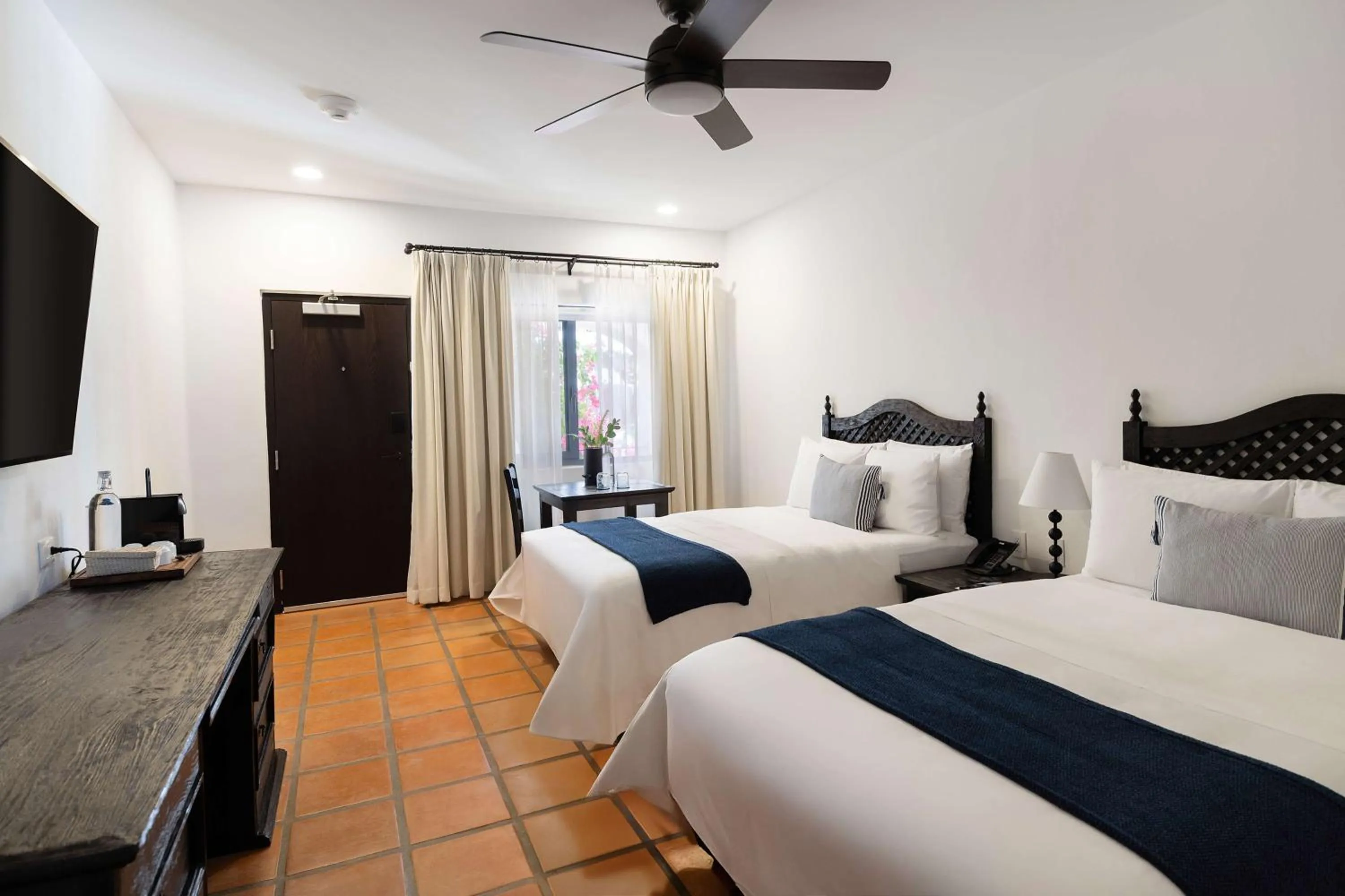 Guest Room with Two Full Beds in Tropicana Los Cabos, Tapestry Collection by Hilton