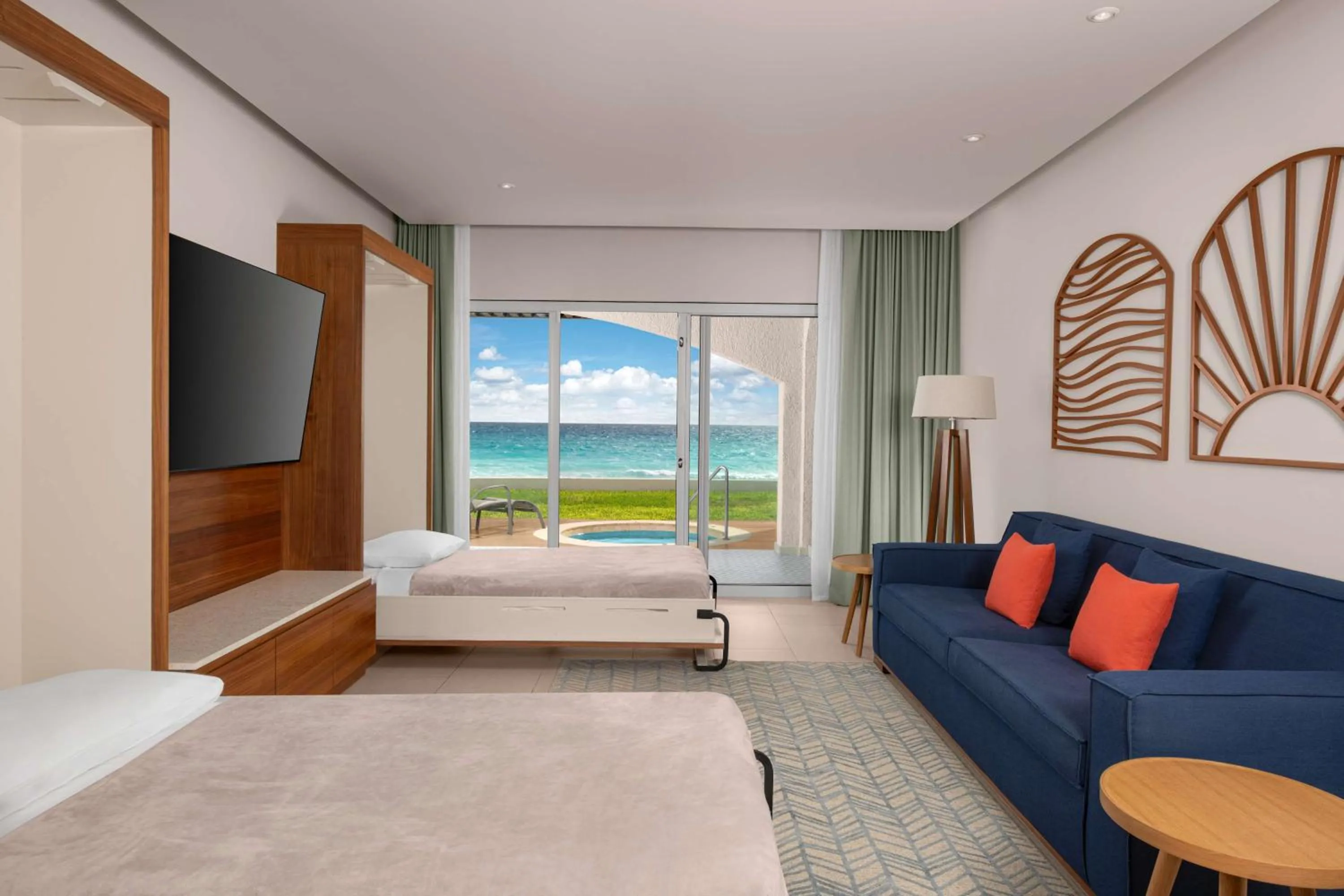 Enclave Beachfront King Room with Two Murphy Beds - single occupancy in Hilton Cancun Mar Caribe All-Inclusive Resort