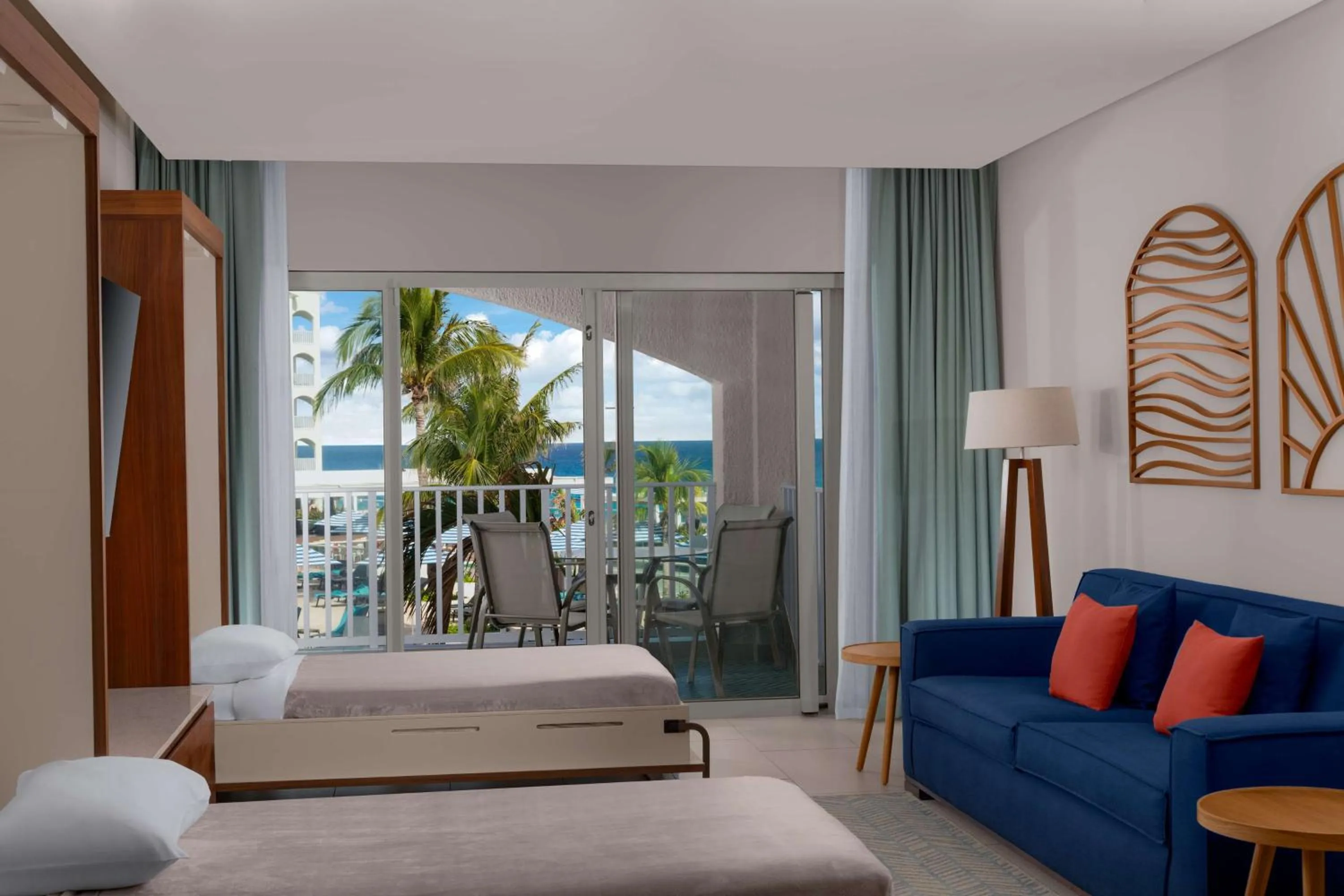King Suite with Two Murphy Beds and Roll-In Shower - single occupancy - Ocean View in Hilton Cancun Mar Caribe All-Inclusive Resort