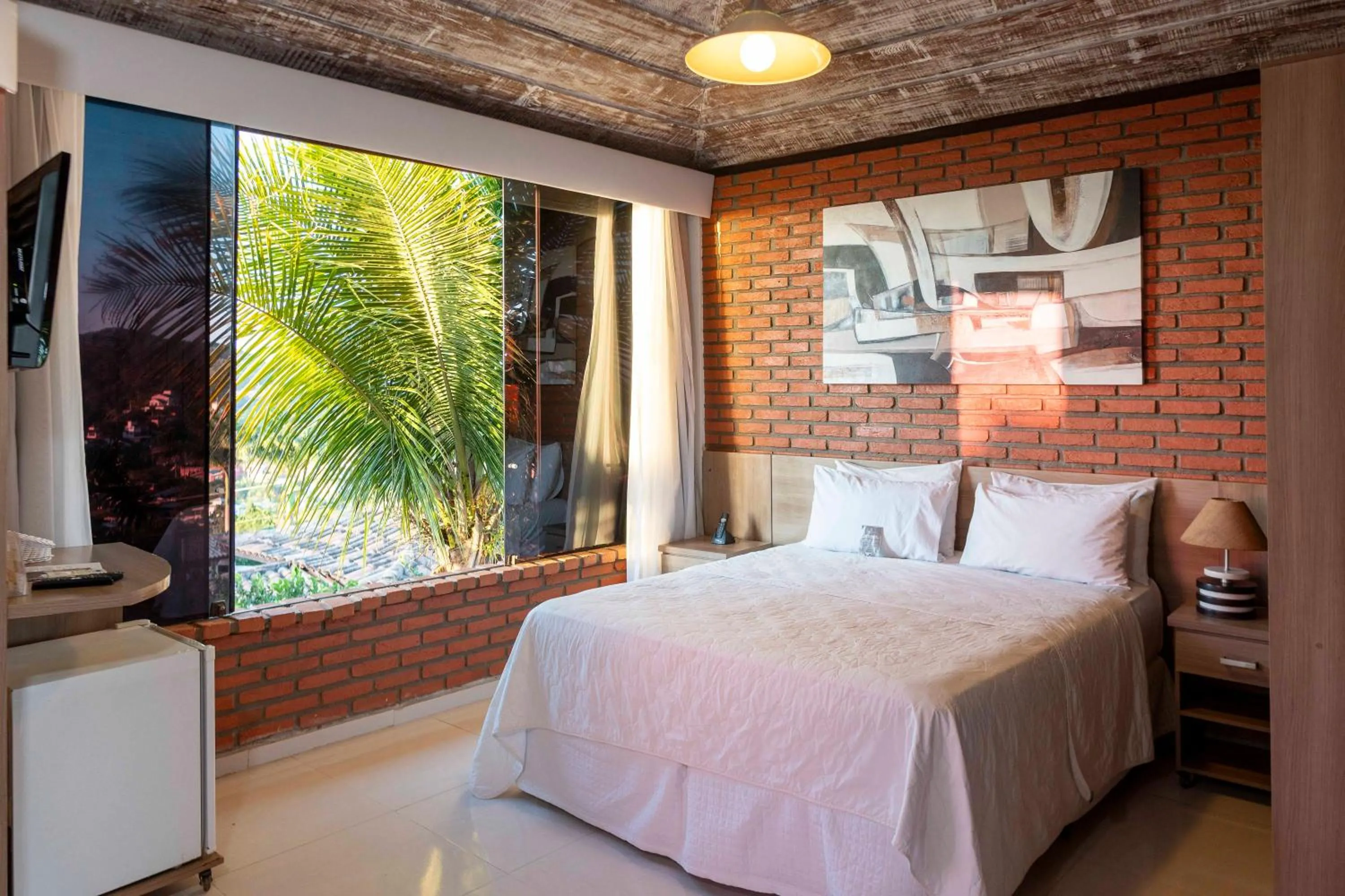 Standard Suite with Garden View in Costa do Sol Boutique Hotel