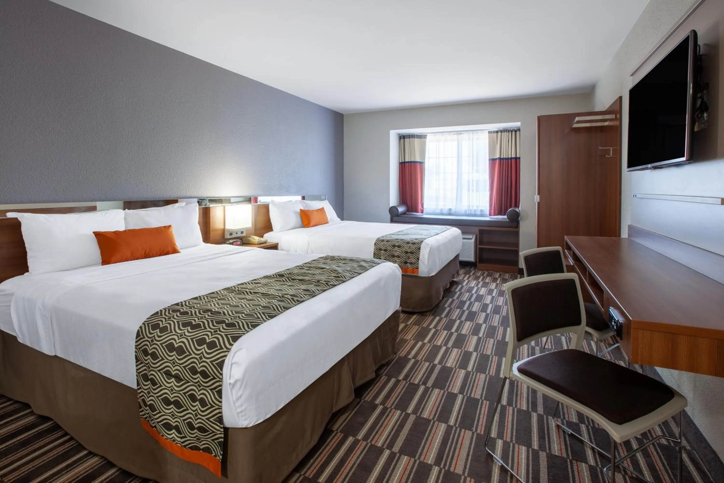 Queen Room with Two Queen Beds - Non-Smoking in Microtel Inn & Suites by Wyndham Sunbury - Columbus North