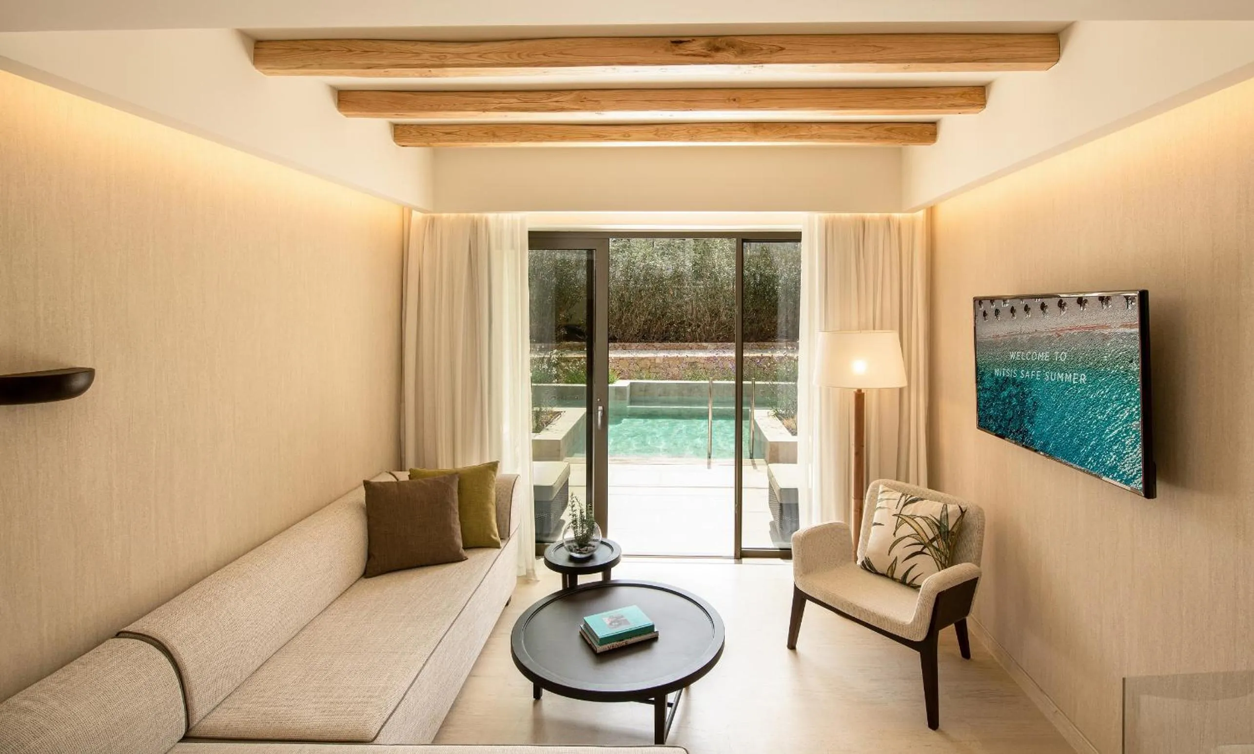 Family Two-Bedroom Suite Swim Up Sharing Pool in Mitsis Selection Rinela