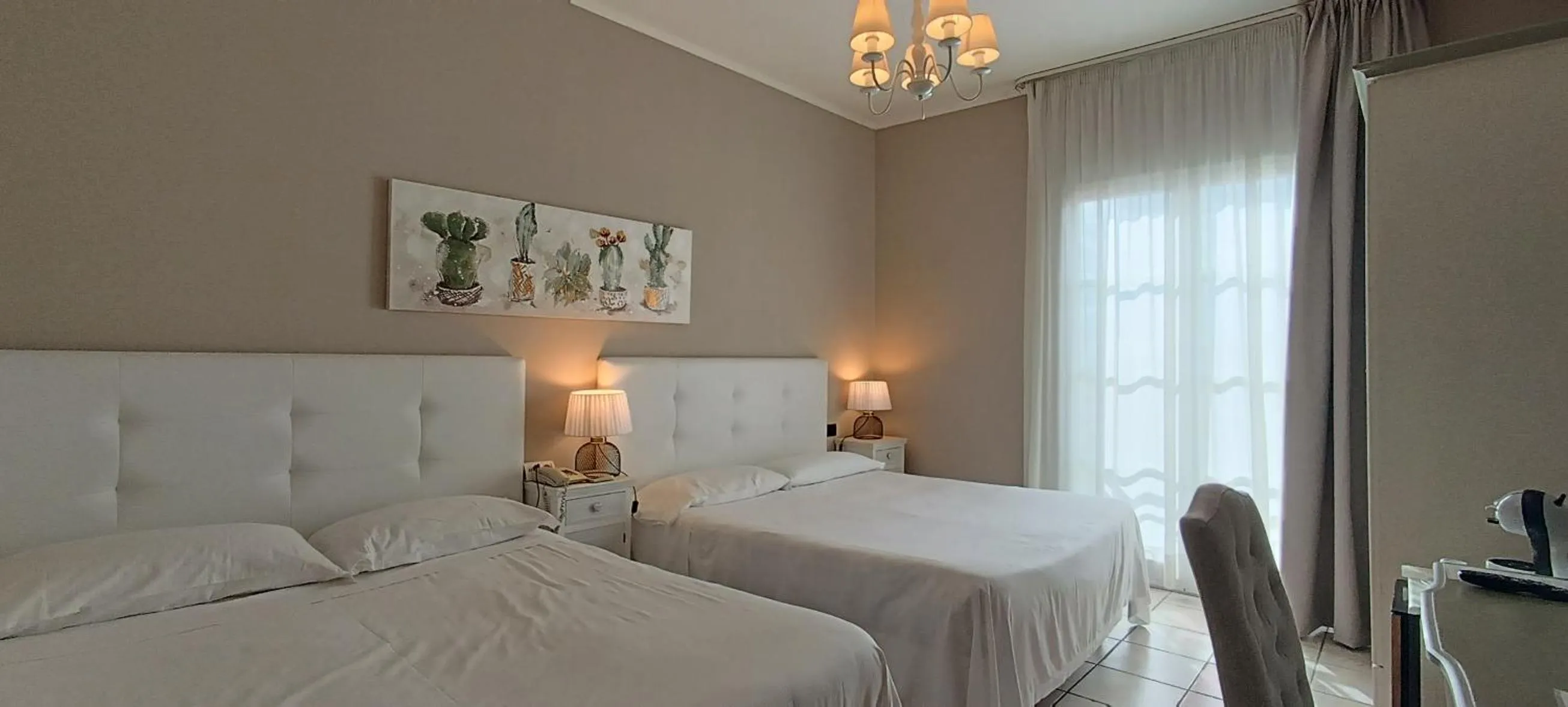 Premium Quadruple Room in Hotel Palladium