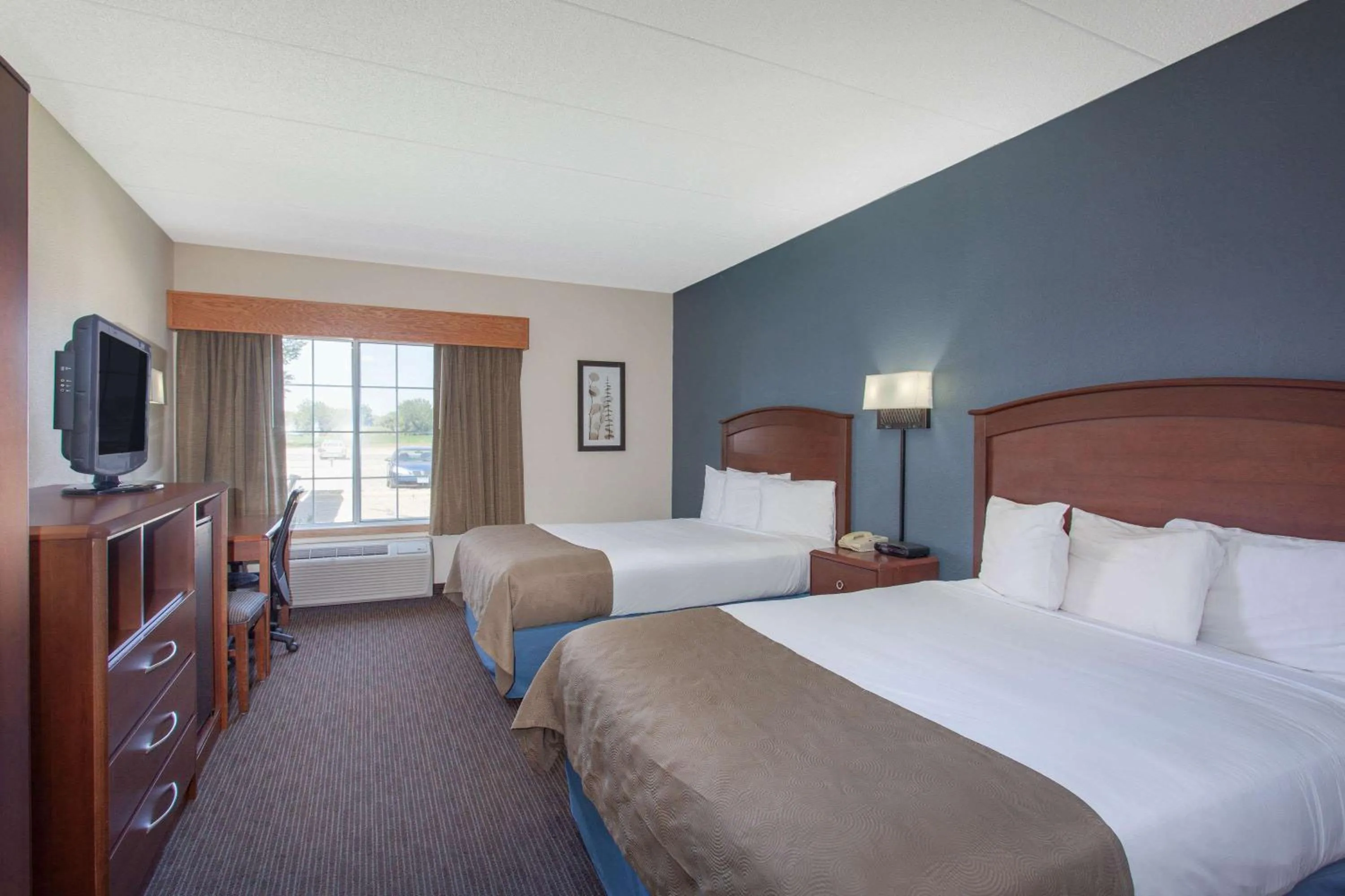 Queen Room with Two Queen Beds - Upper Floor/Non-Smoking in AmericInn by Wyndham Hutchinson