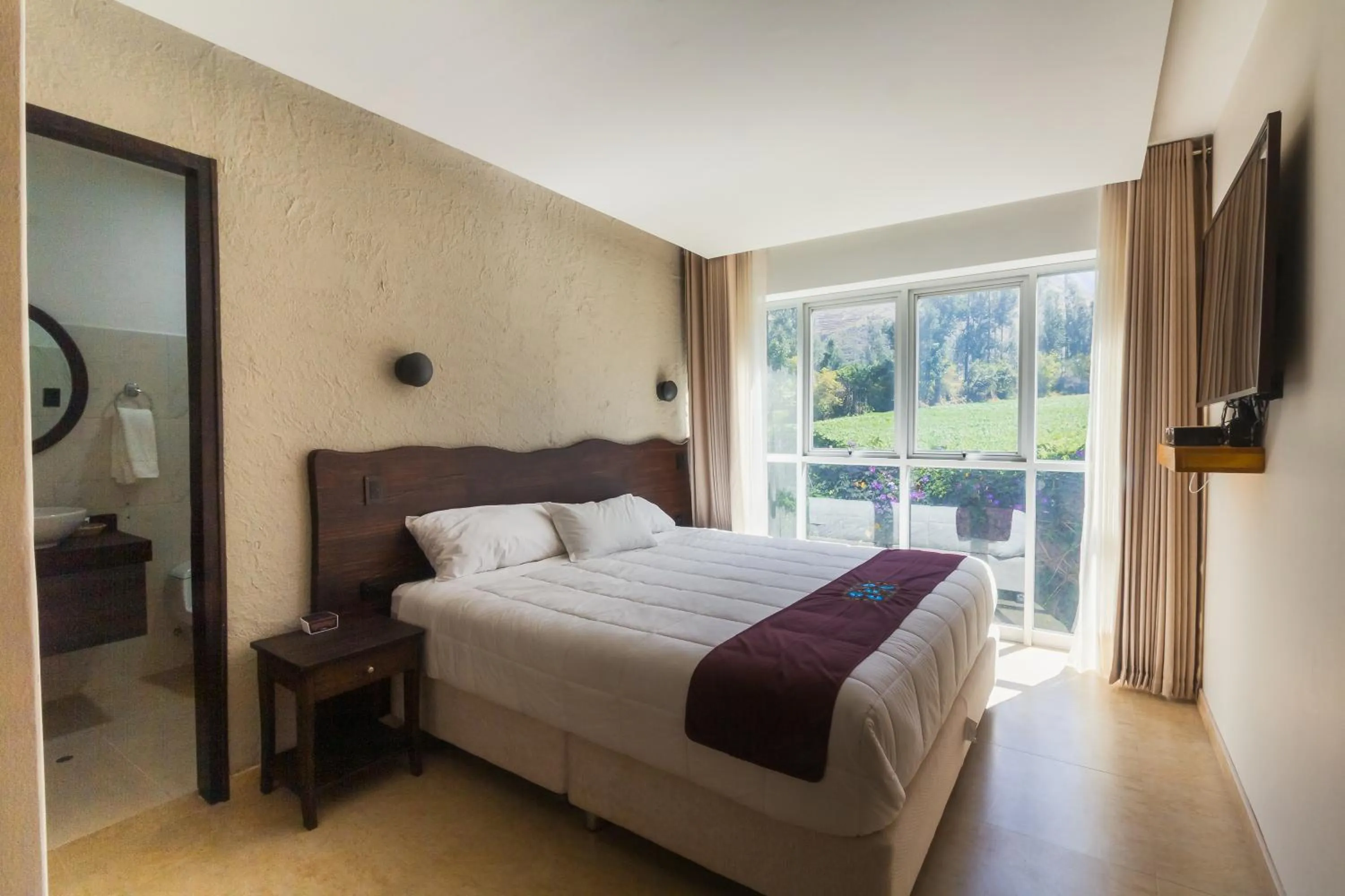 Master Suite with Balcony and Garden View - single occupancy in Life Hotel Valle Sagrado