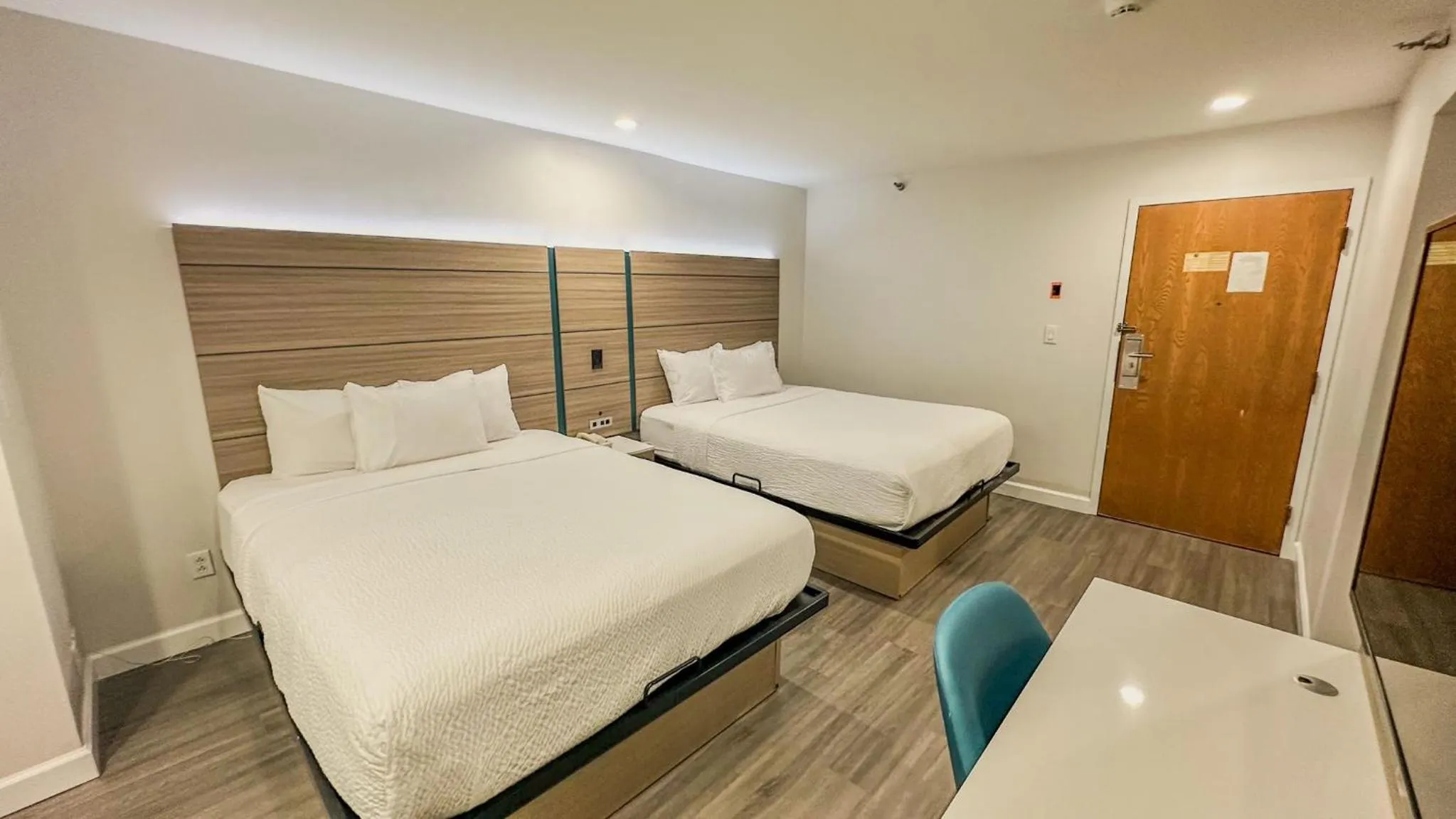 Queen Room with Two Queen Beds - Non-Smoking in Microtel Inn by Wyndham Henrietta