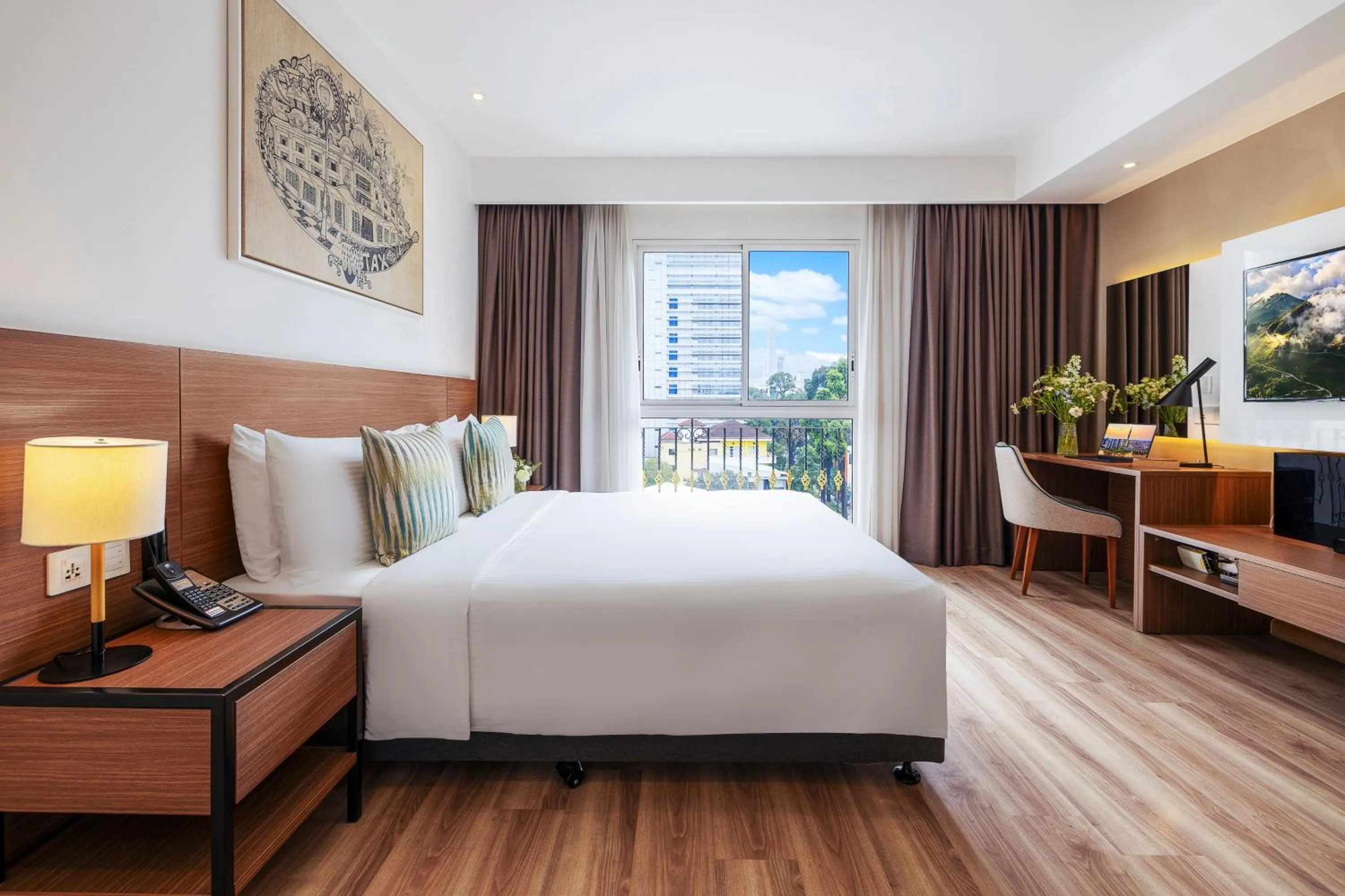 Deluxe Queen Room City View in T-Ritz Saigon Hotel & Apartment