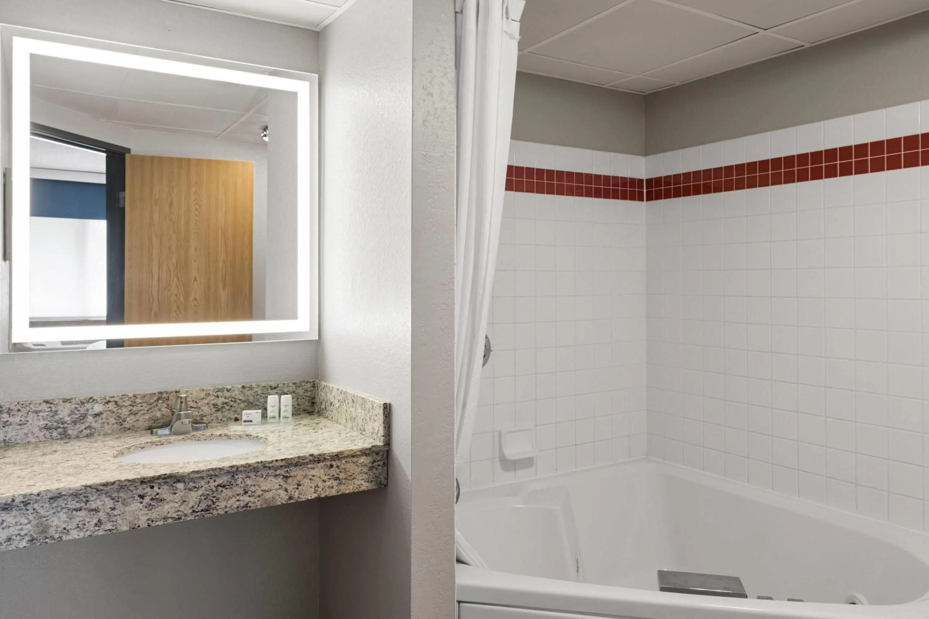 Premier King Suite - Non-Smoking in AmericInn by Wyndham Alexandria