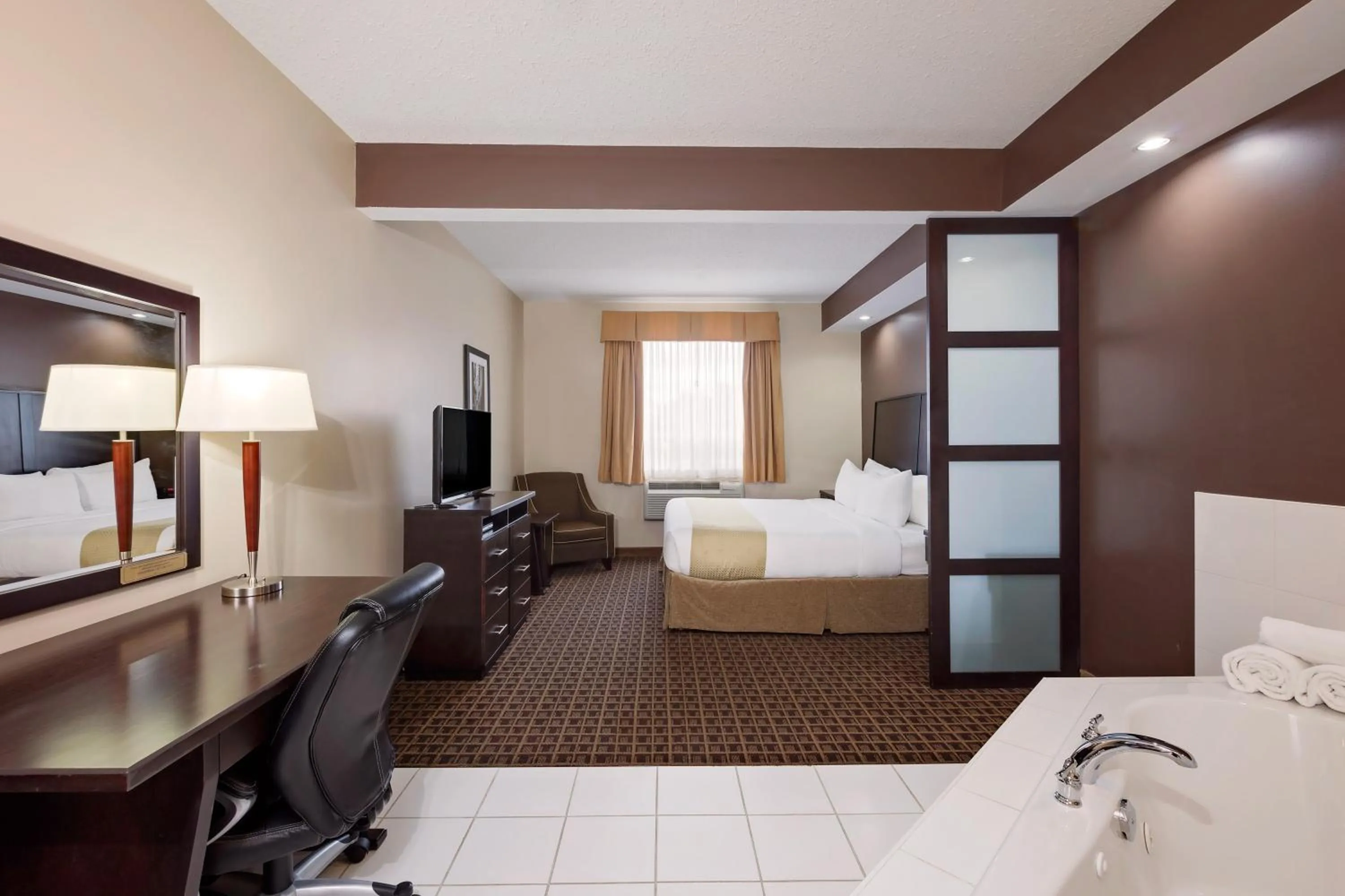 King Suite with Hot Tub - Non-Smoking in Ramada by Wyndham Cold Lake