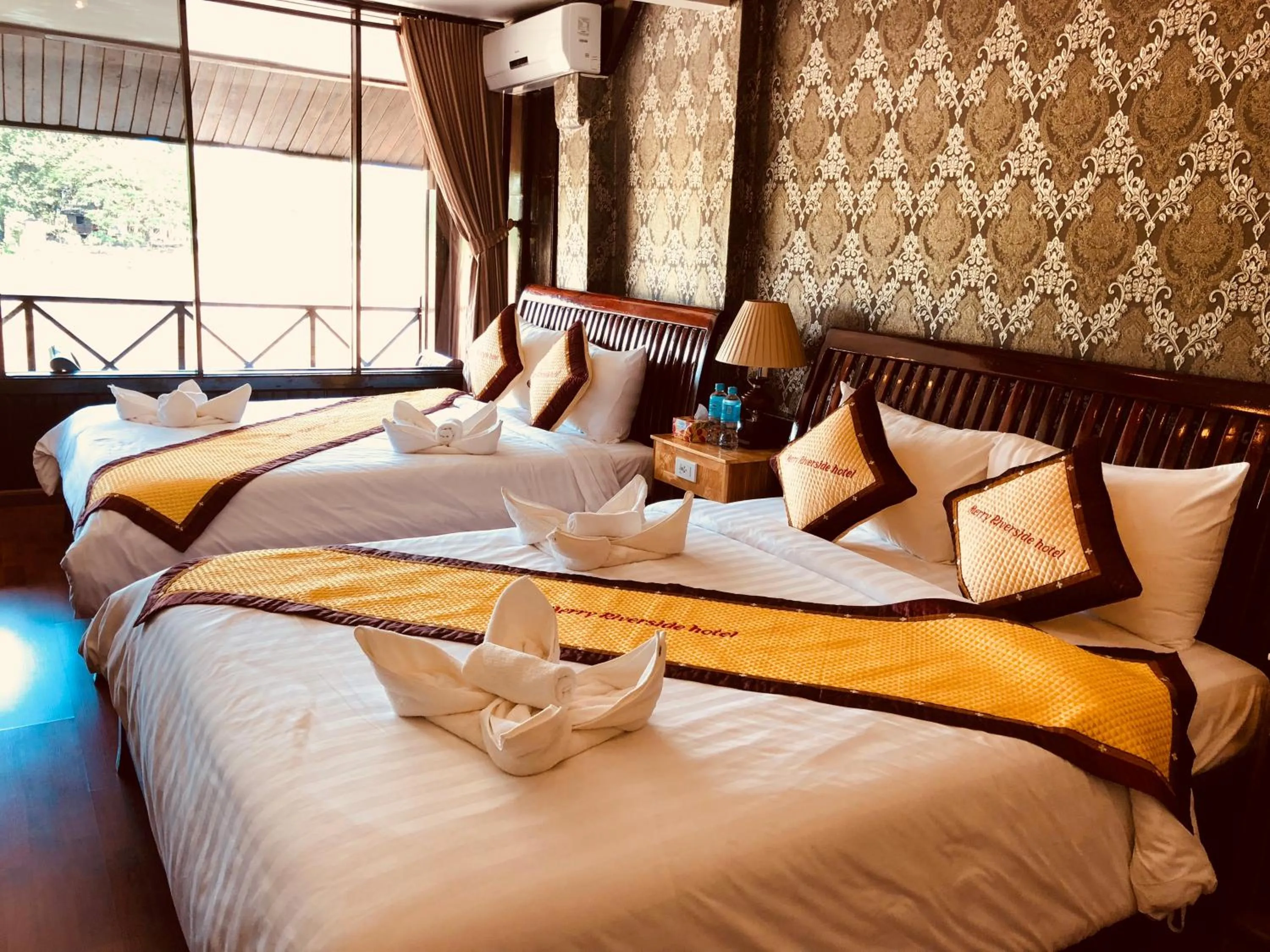 Family Room with Balcony and River View in Merry Riverside Hotel