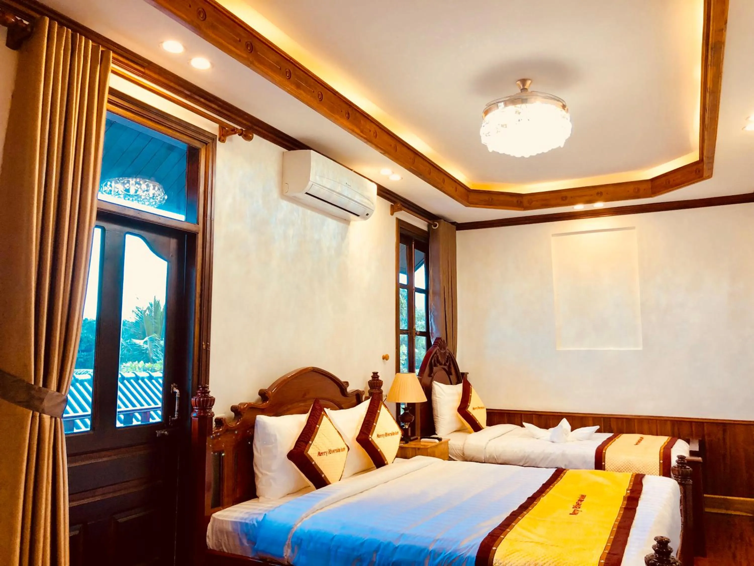 Family Two-Bedroom Suite with River View in Merry Riverside Hotel