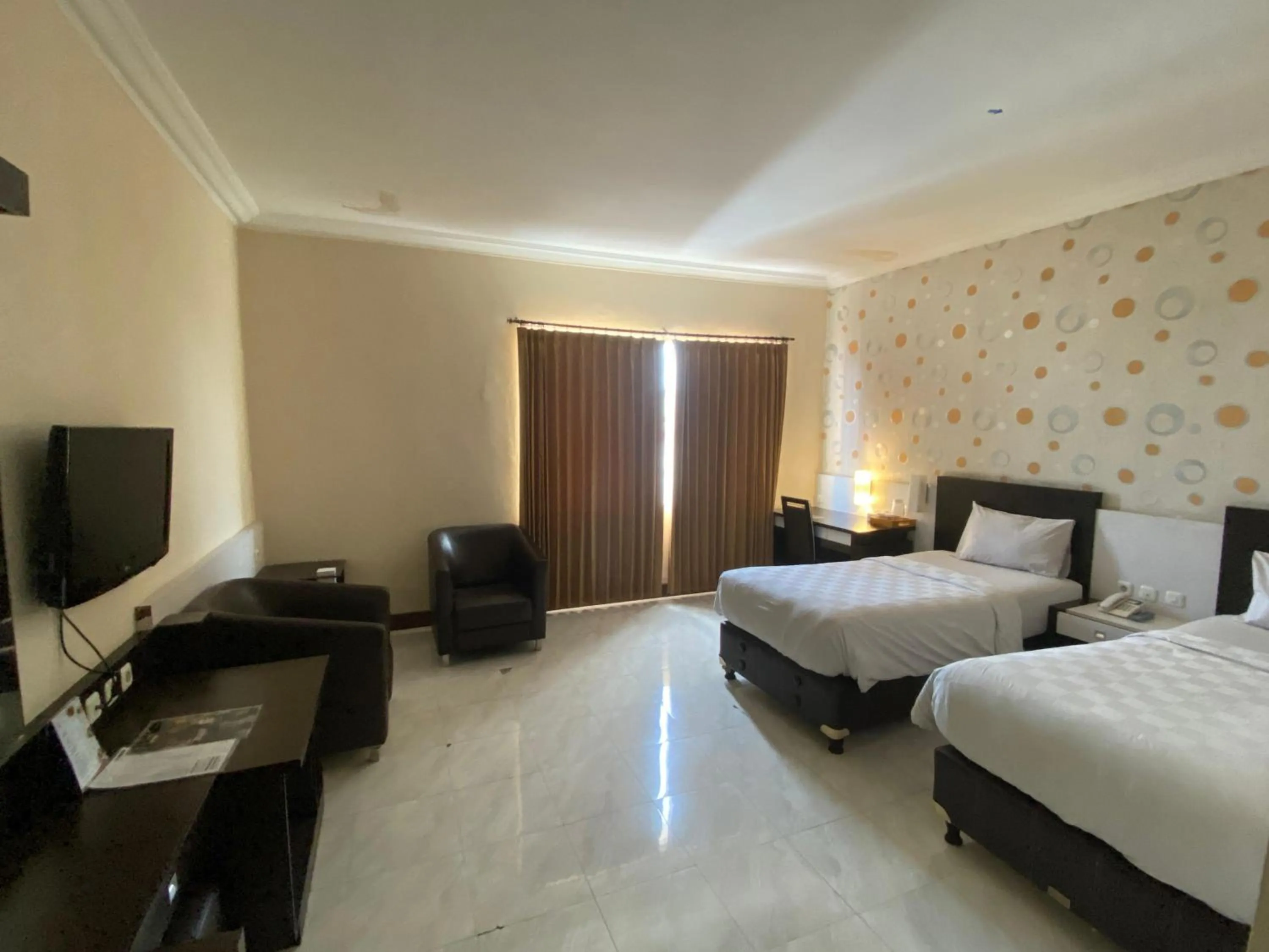 Deluxe Twin Room in Hotel 88 Jember By WH - Strategic Location In The City Center