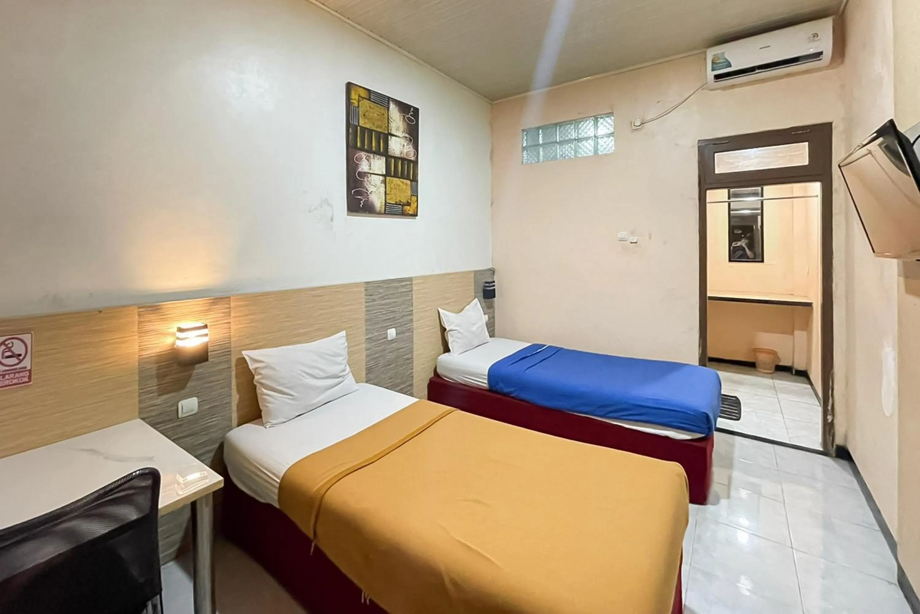 Deluxe Twin Room in Urbanview Hotel Delima 101 Syariah