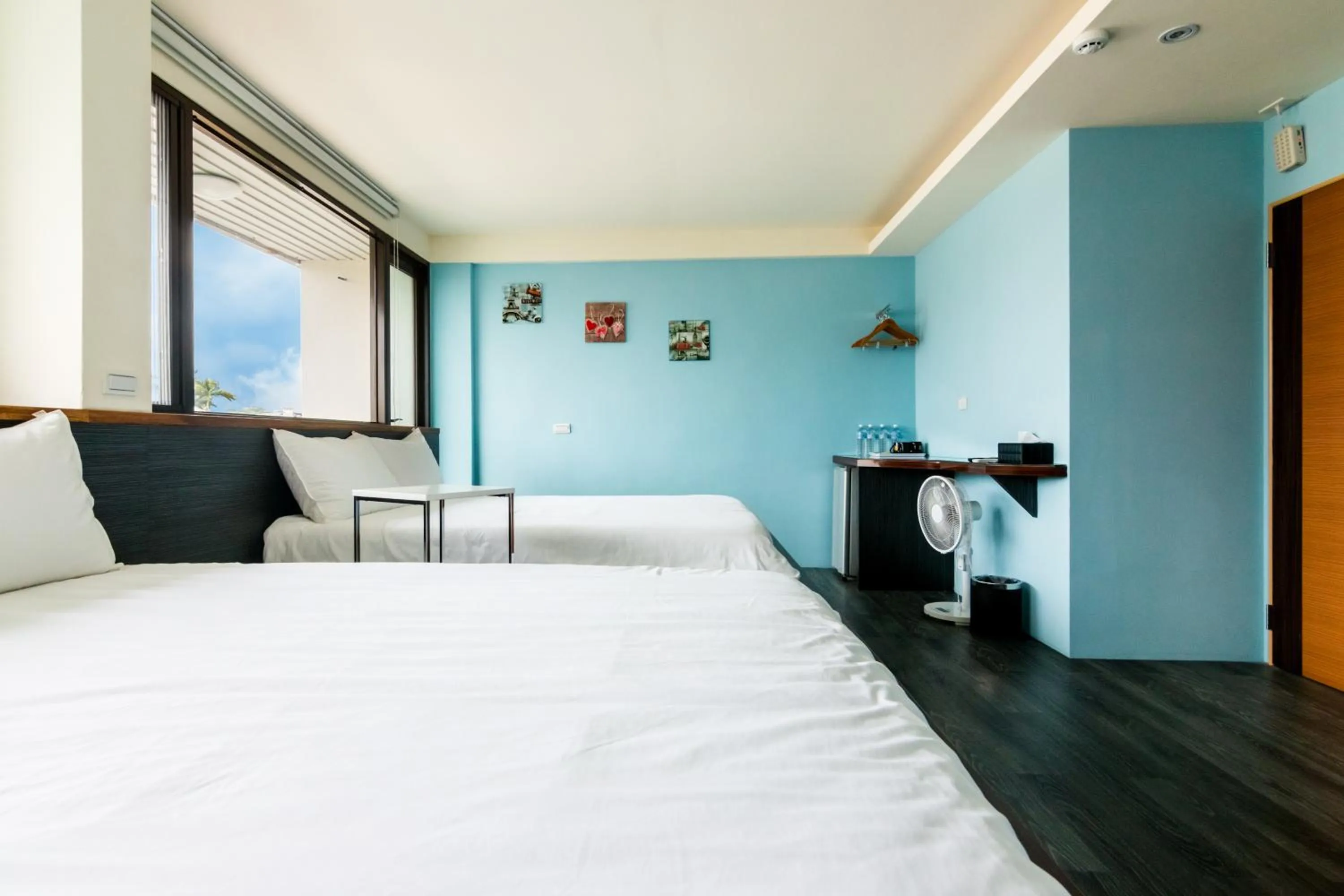 Large Quad Room With Balcony in BoBo's Homestay