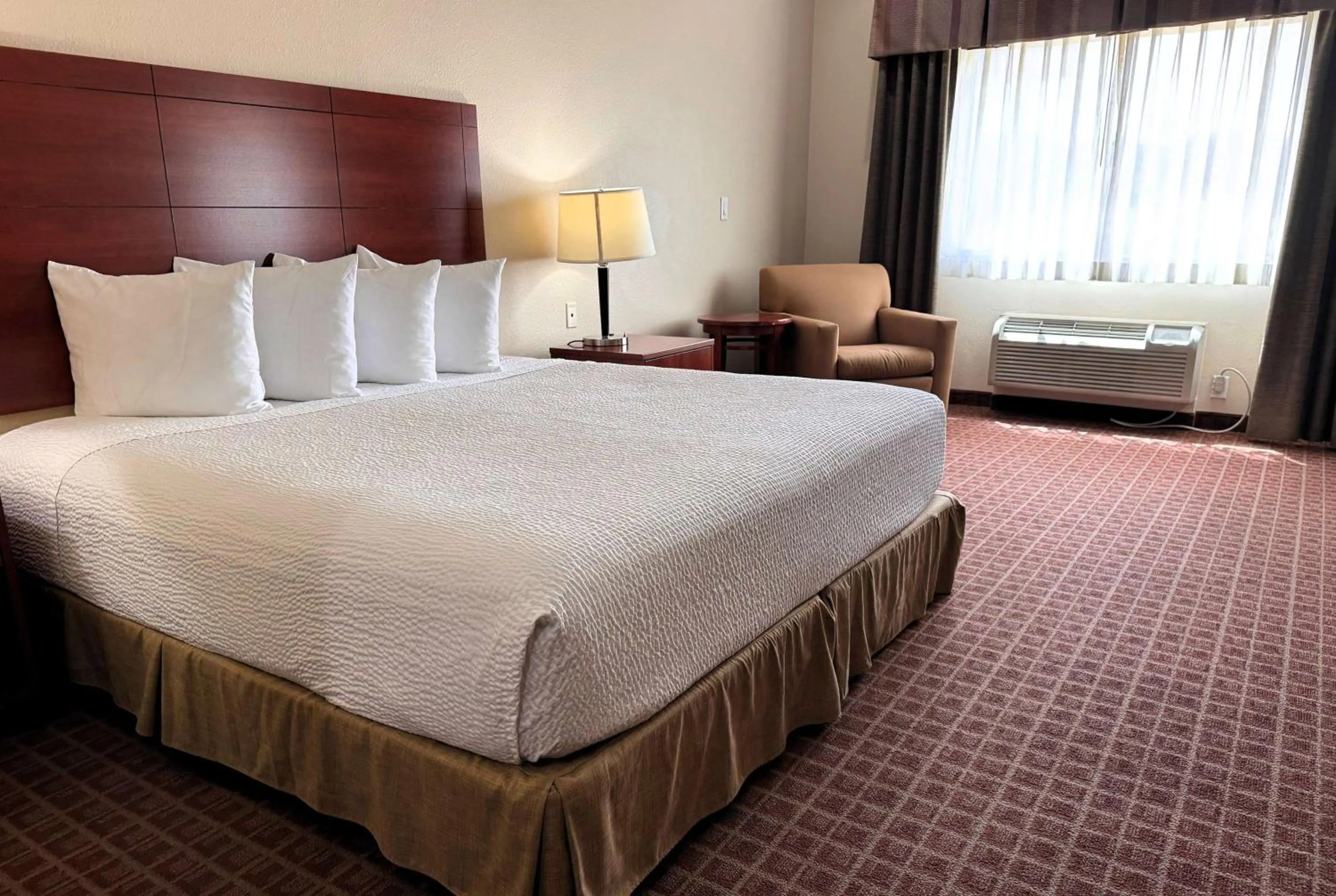 King Suite with Sofa Bed - Disability Access - Non-Smoking in Ramada by Wyndham College Station