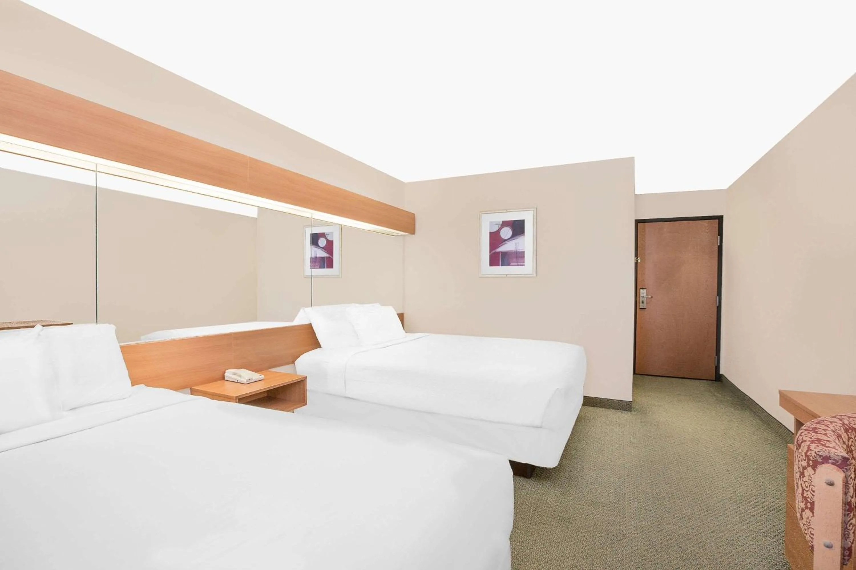 Queen Room with Two Queen Beds - Non-Smoking in Microtel Inn & Suites by Wyndham Colfax