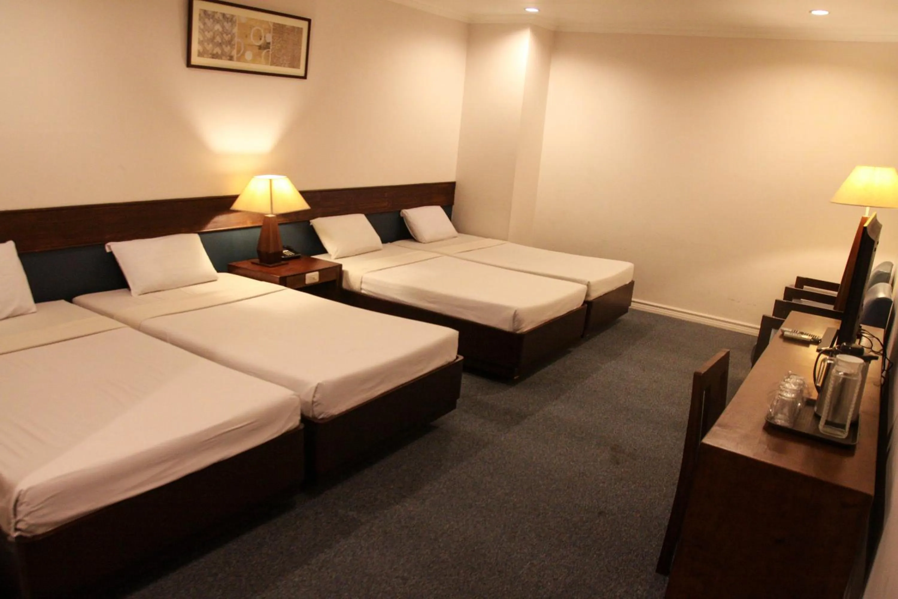 Quadruple Room in De Luxe Hotel