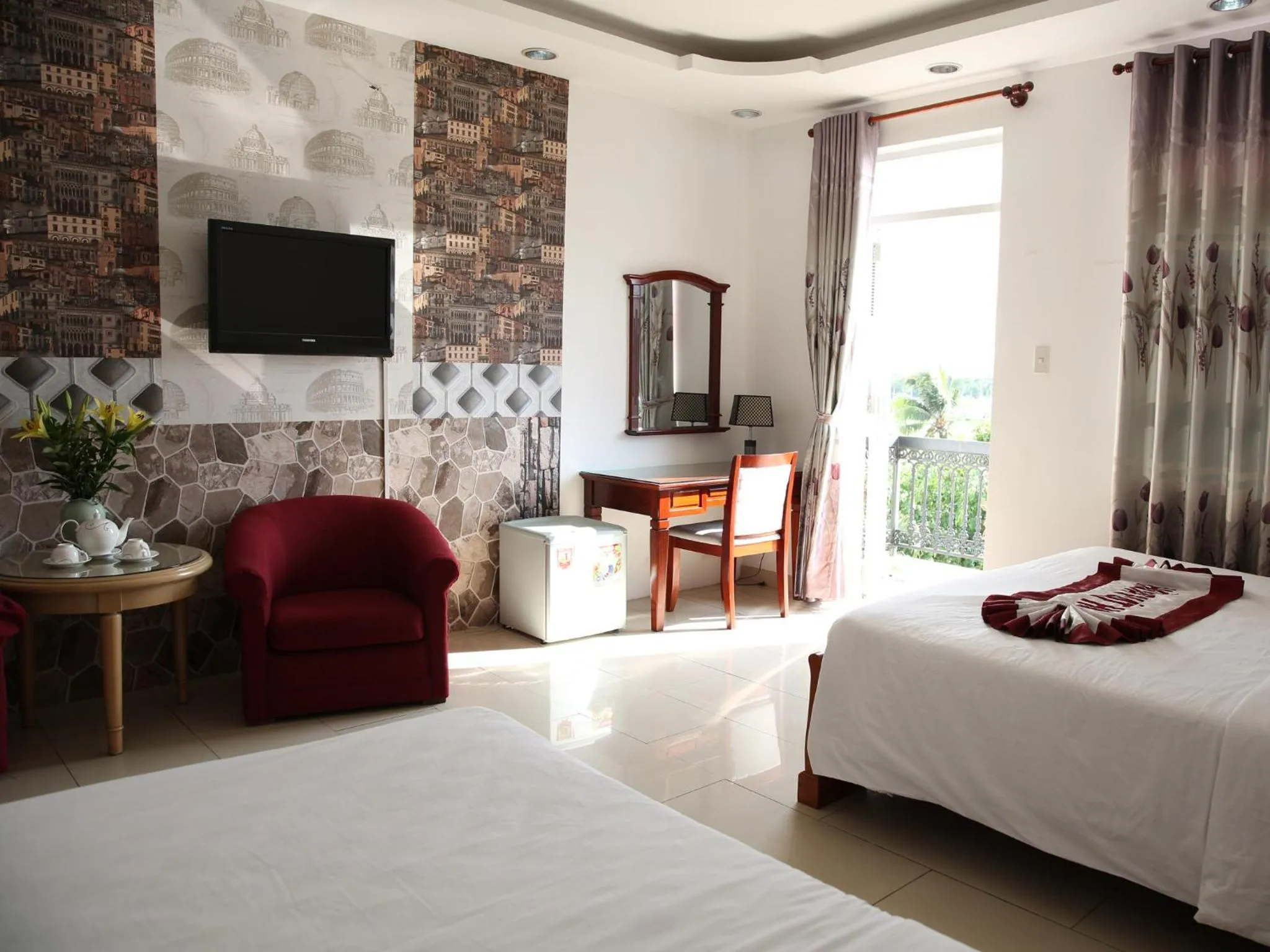 Family Room with Balcony in Hoa Phat Hotel & Apartment