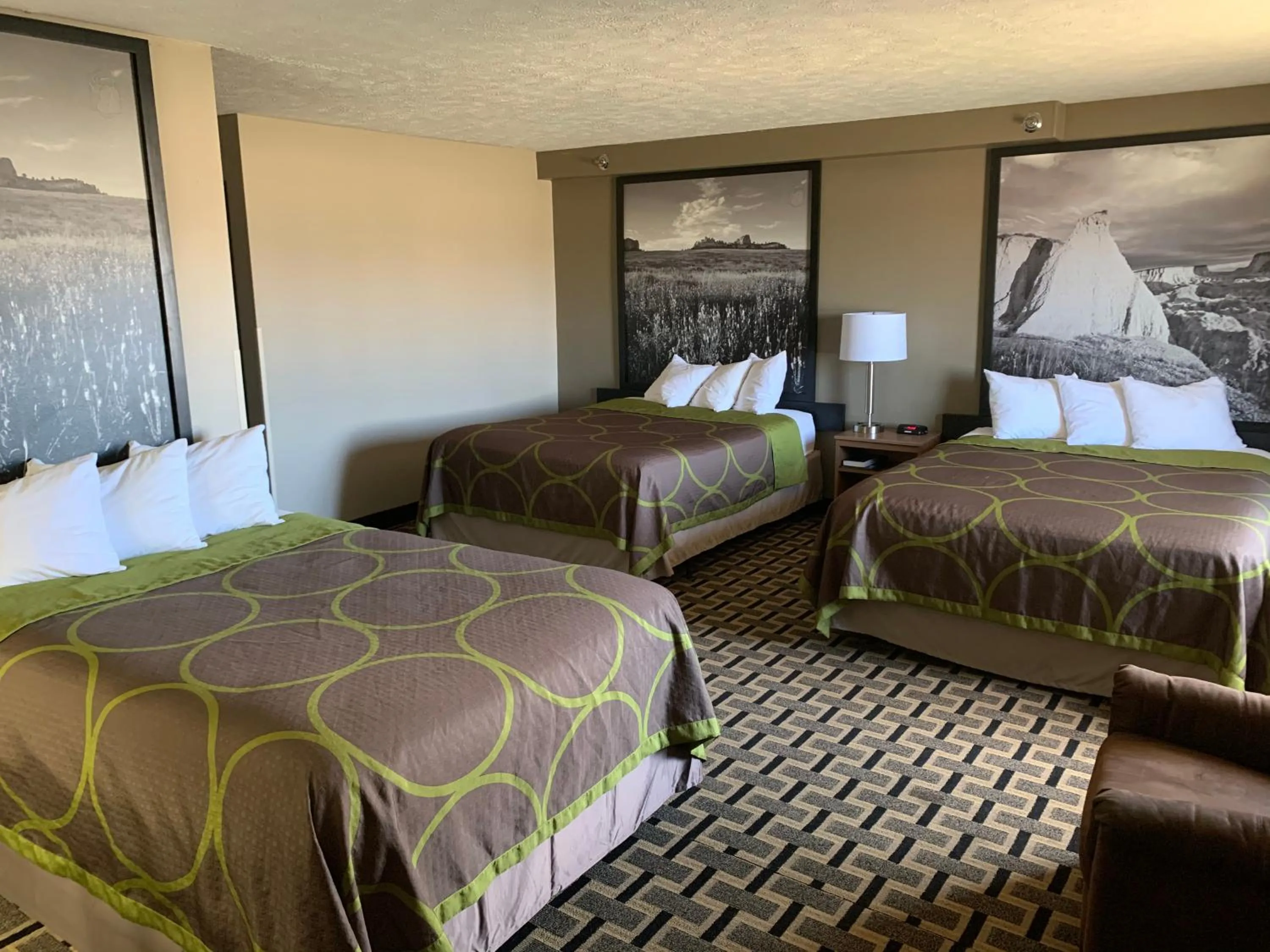 Queen Room with Three Queen Beds - Non-Smoking in Super 8 by Wyndham O Neill NE