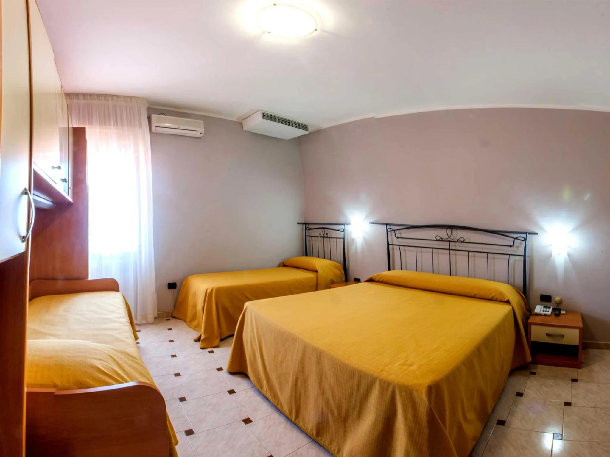 Economy Quadruple Room in La Vigna Hotel