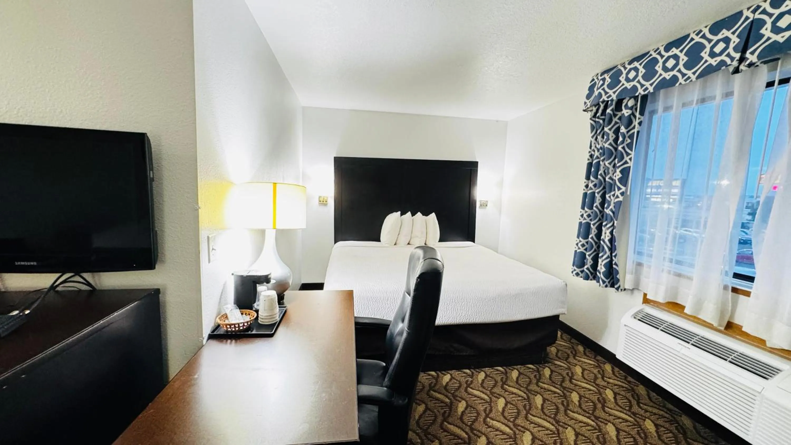 Room with One King and Two Queen Beds - Non-Smoking in Days Inn by Wyndham North Platte