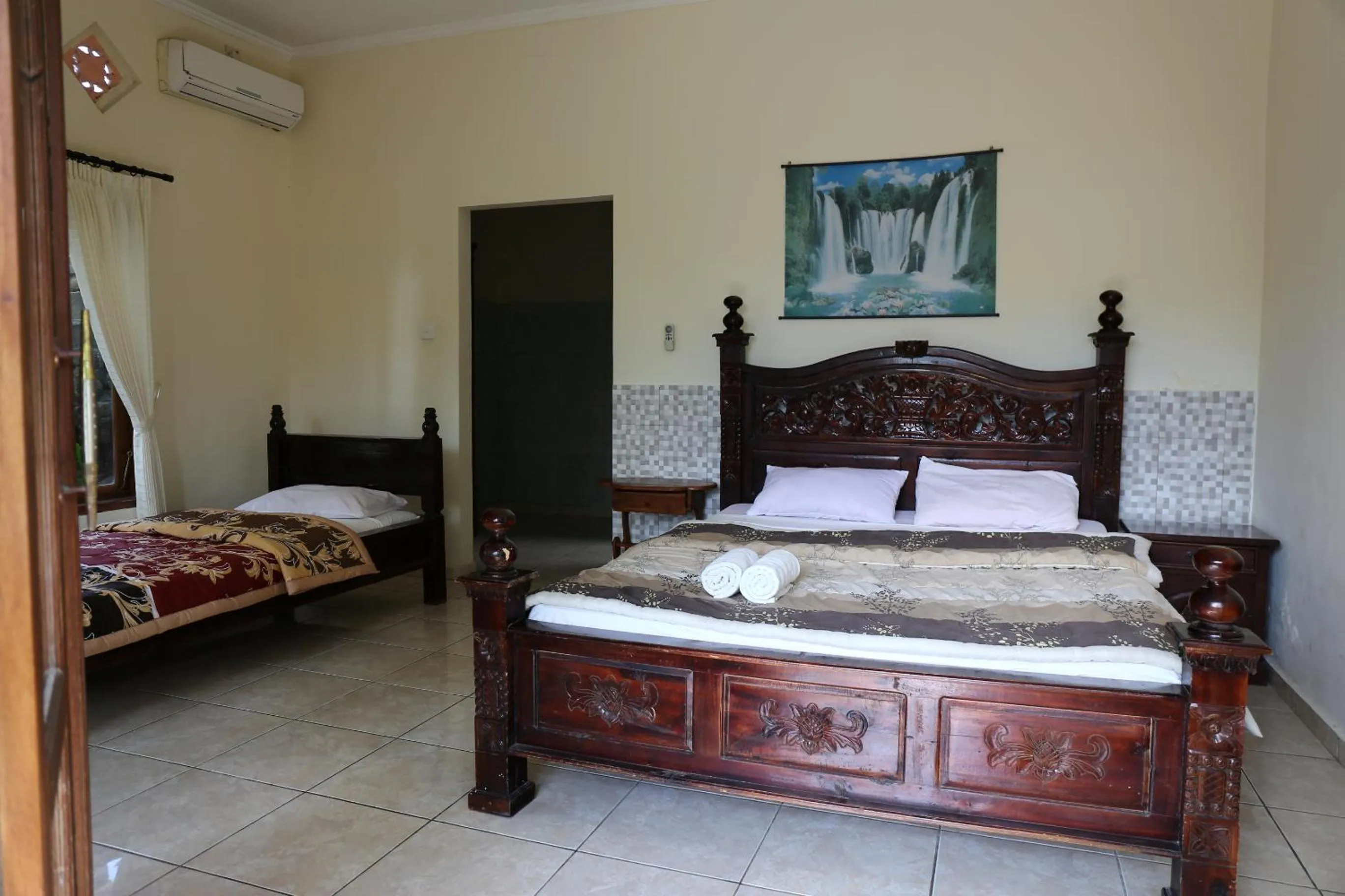 Triple Room with Pool View in Anugerah Villas