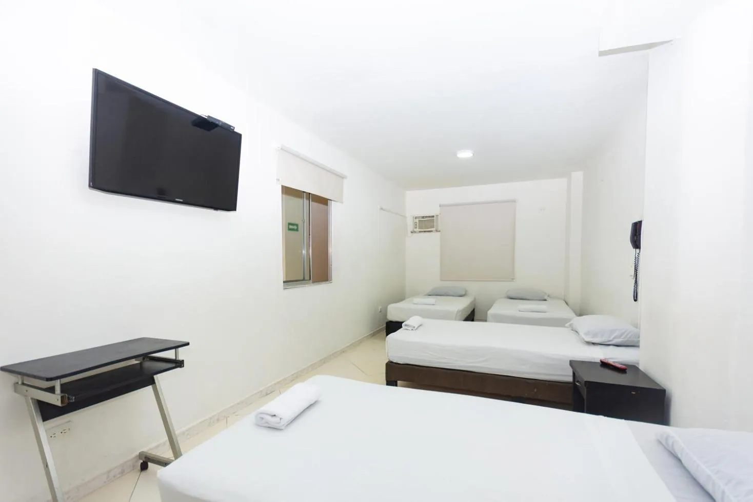 Economy Quadruple Room in Hotel Villa Real