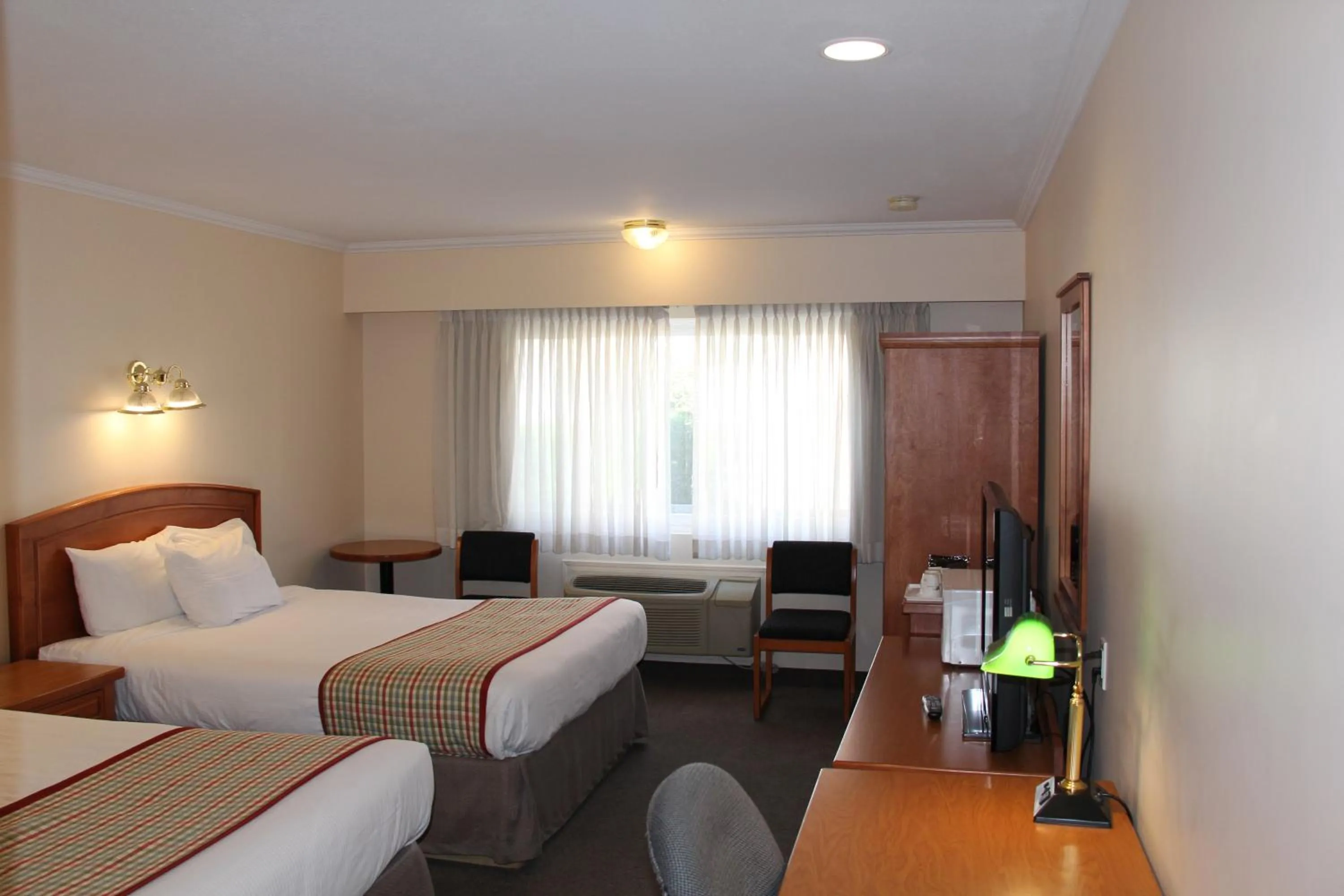 Queen Room with Two Queen Beds - Non-Smoking in Travelodge by Wyndham Kamloops