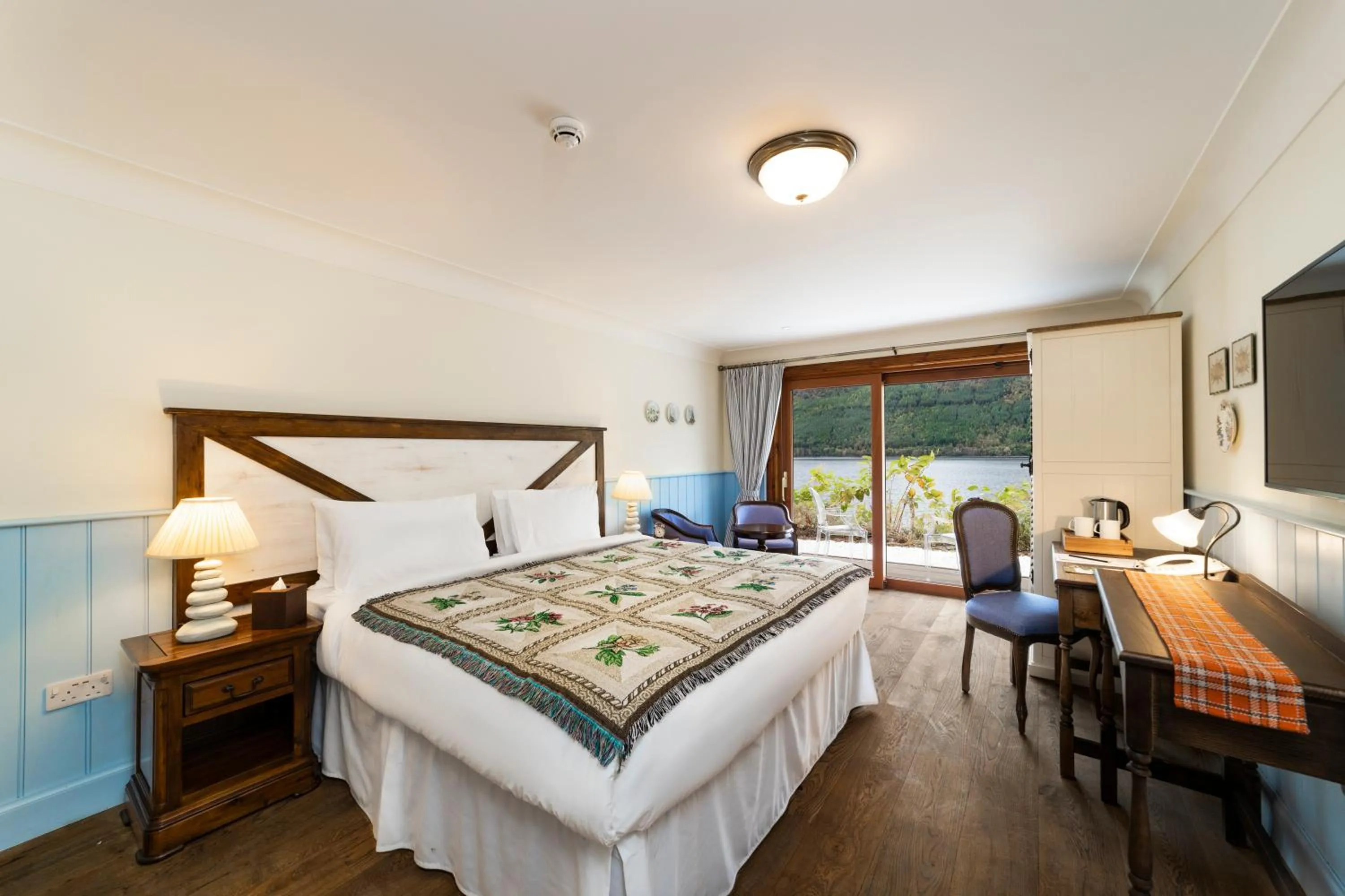 King Room with Lake View in The Whispering Pine Lodge