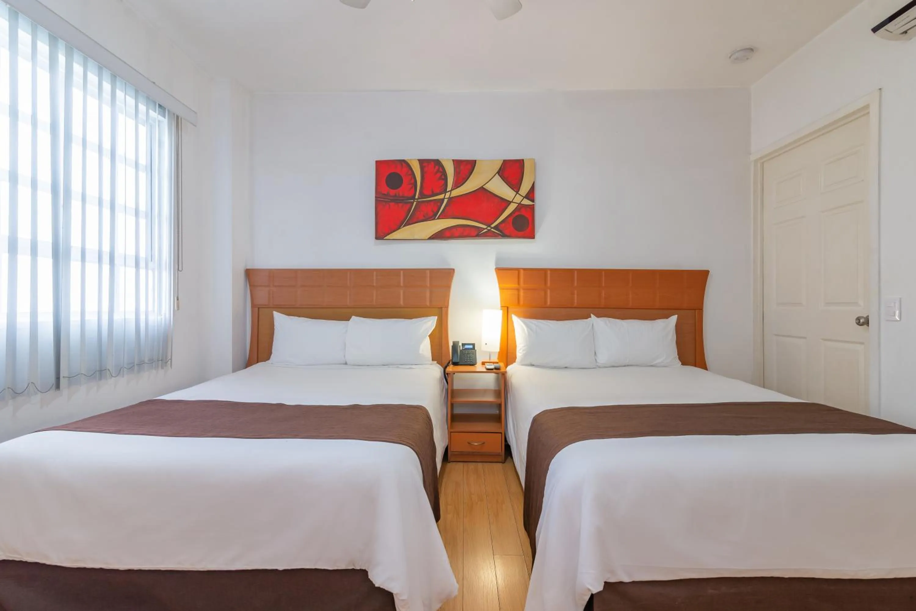 Twin Room in European Life Style Executive Suites